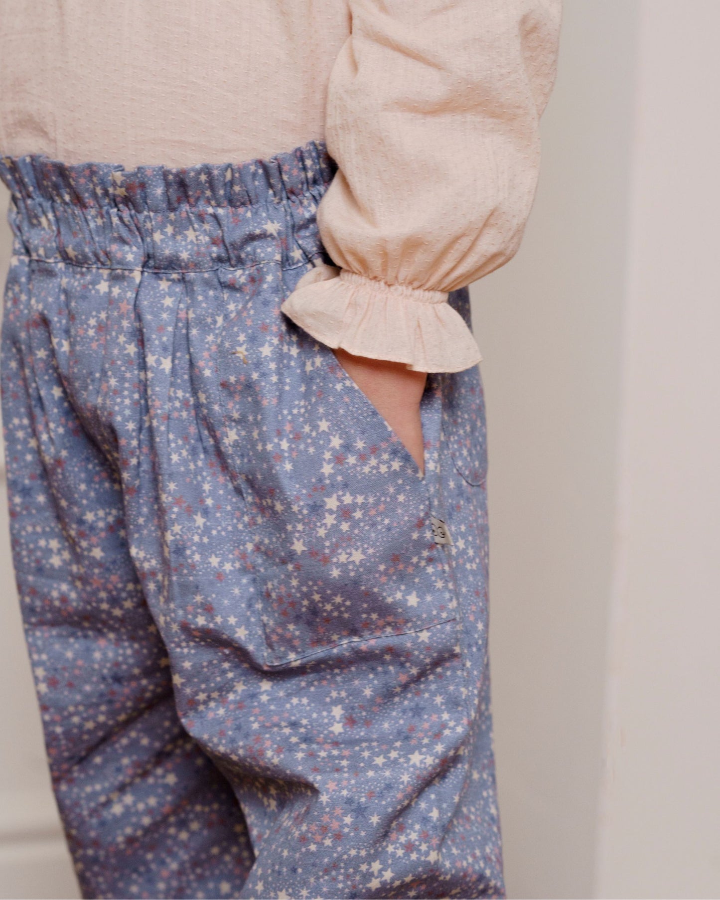 Early Sunday, Adrien Trouser in Celestial print, made from Printed 30s Cotton Twill fabric, featuring Relaxed design with ample room for movement, perfect for active kids, shown in a close-up of print