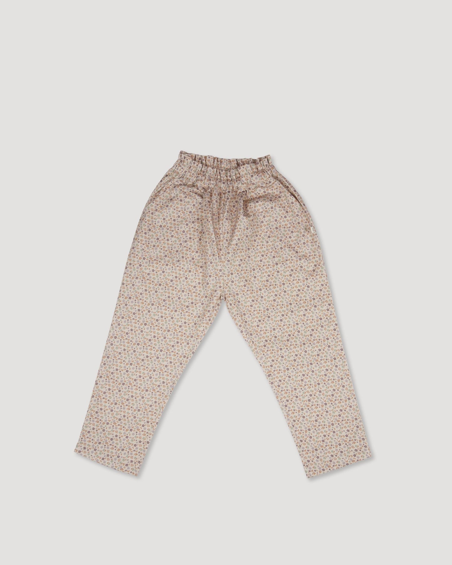 Early Sunday, Adrien Trouser in Floral print, made from Printed 30s Cotton Twill fabric, featuring Relaxed design with ample room for movement, perfect for active kids, shown in a front flat-lay view