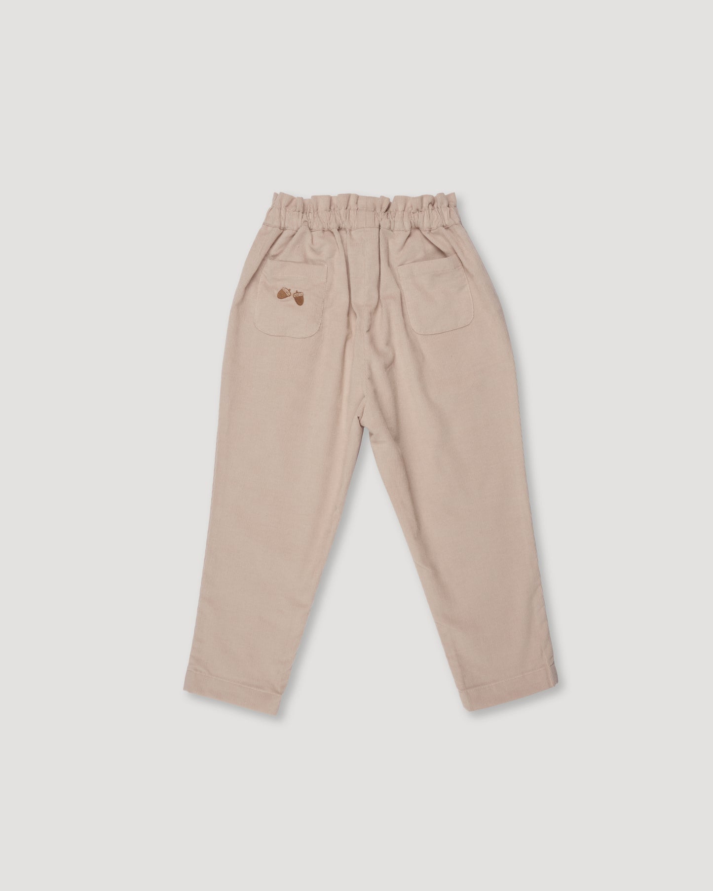 Early Sunday, Adrin Trouser in Beige, made from Cotton Corduroy fabric, featuring a relaxed silhouette with a comfortable elastic waistband, shown in a back flat-lay view