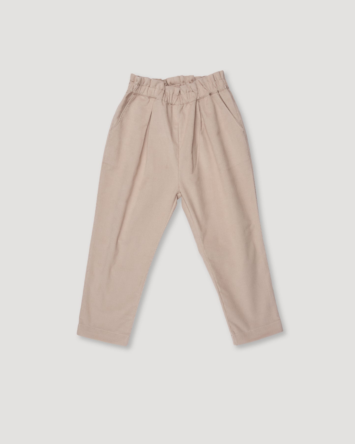 Early Sunday, Adrin Trouser in Beige, made from Cotton Corduroy fabric, featuring a relaxed silhouette with a comfortable elastic waistband, shown in a front flat-lay view