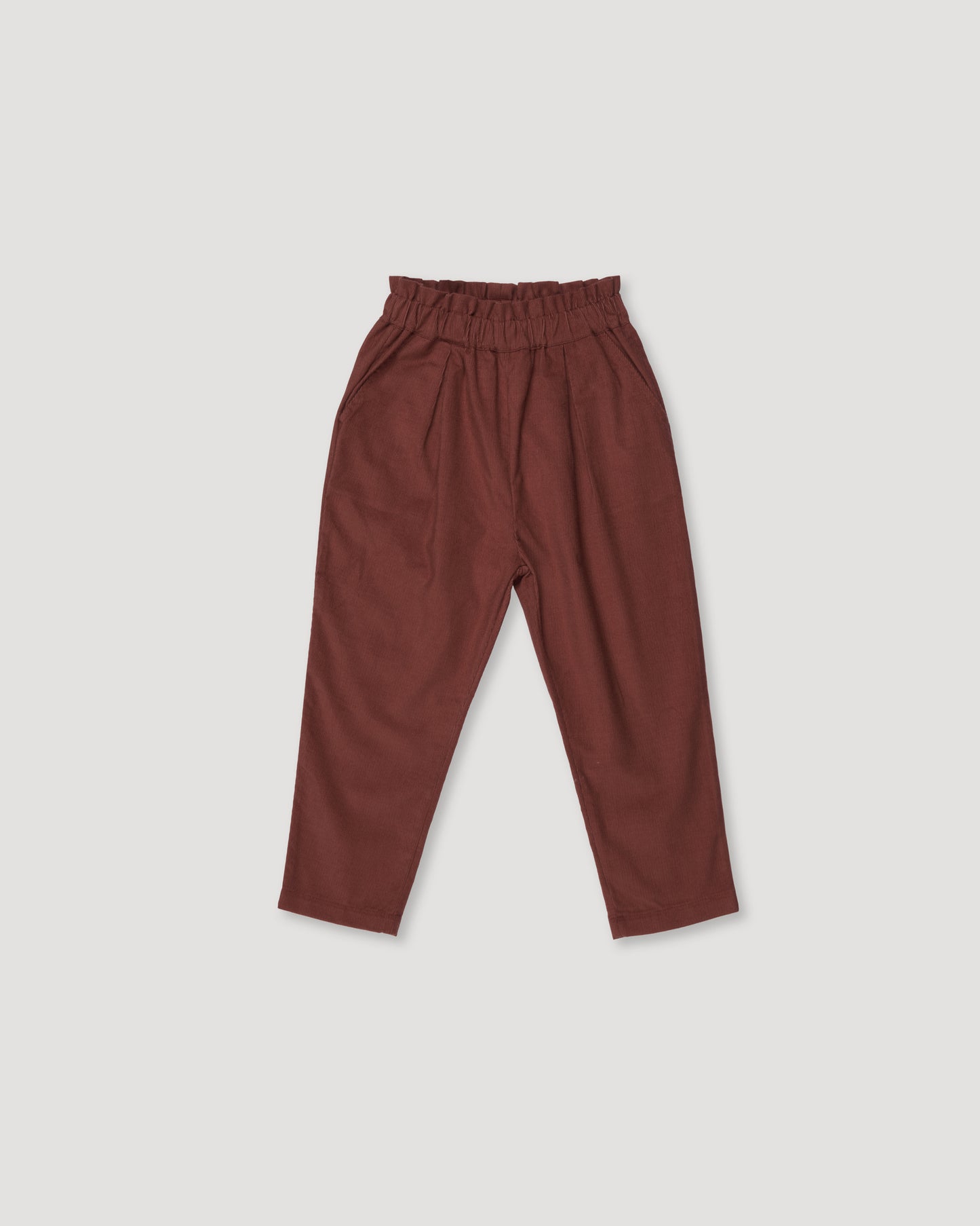 Early Sunday, Adrin Trouser in Caramel, made from Cotton Corduroy fabric, featuring a relaxed silhouette with a comfortable elastic waistband, shown in a front flat-lay view