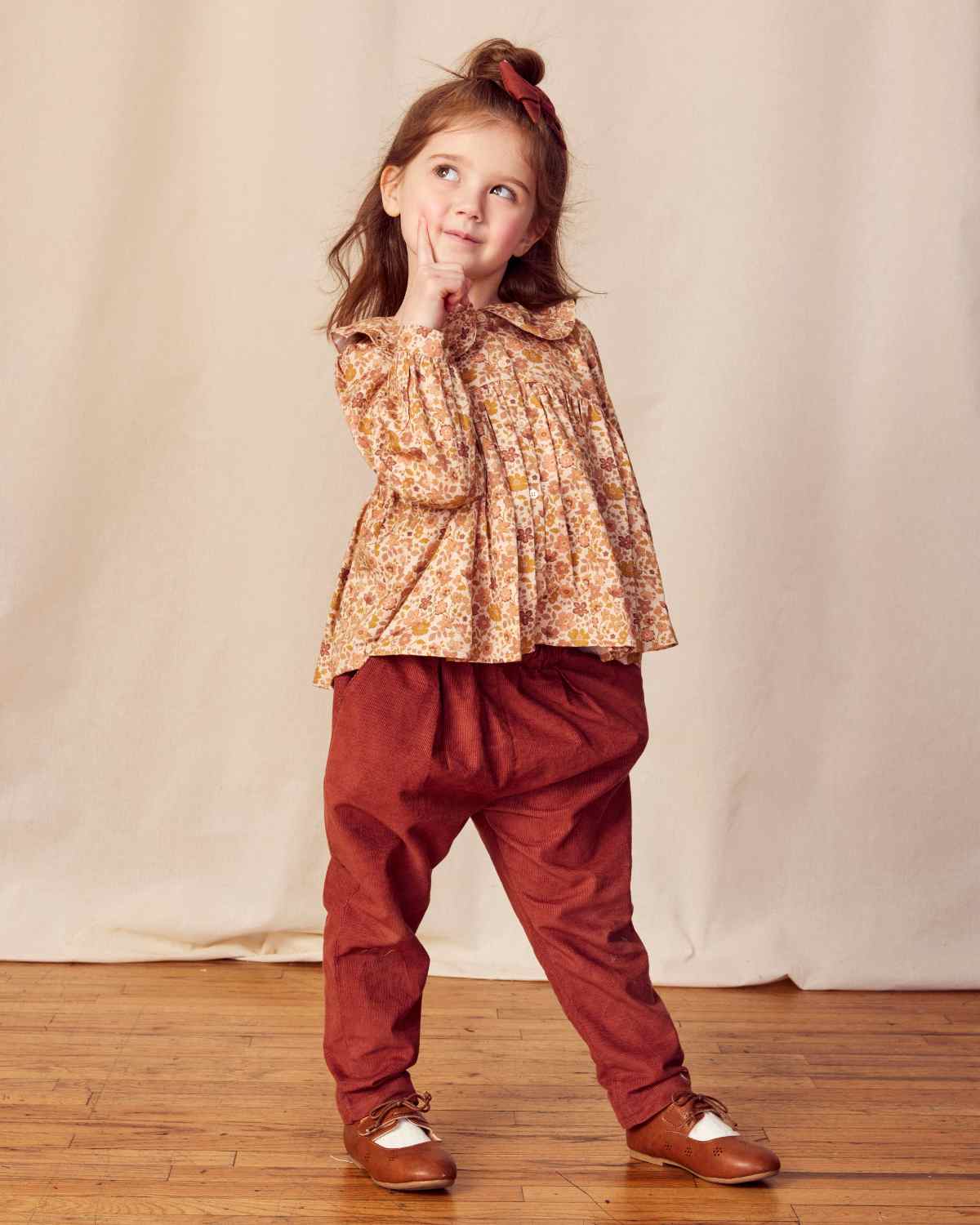 Early Sunday, Adrin Trouser in Caramel, made from Cotton Corduroy fabric, featuring a relaxed silhouette with a comfortable elastic waistband, shown in a front view of model wearing it