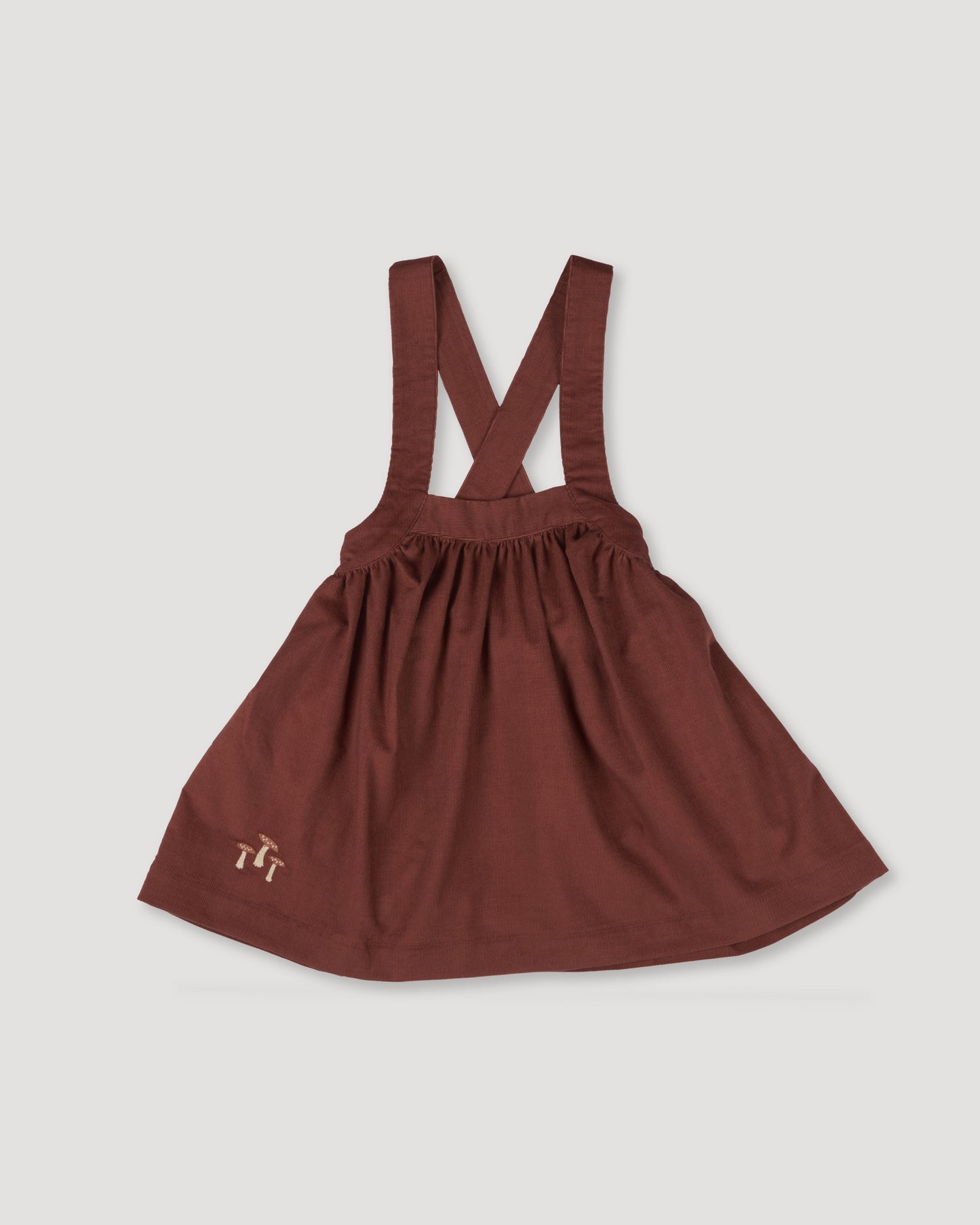Early Sunday, Annie Skirt in Caramel, made from Cotton Corduroy fabric, featuring a relaxed fit with an elastic waistband & beautiful embroidery, shown in a front flat-lay view