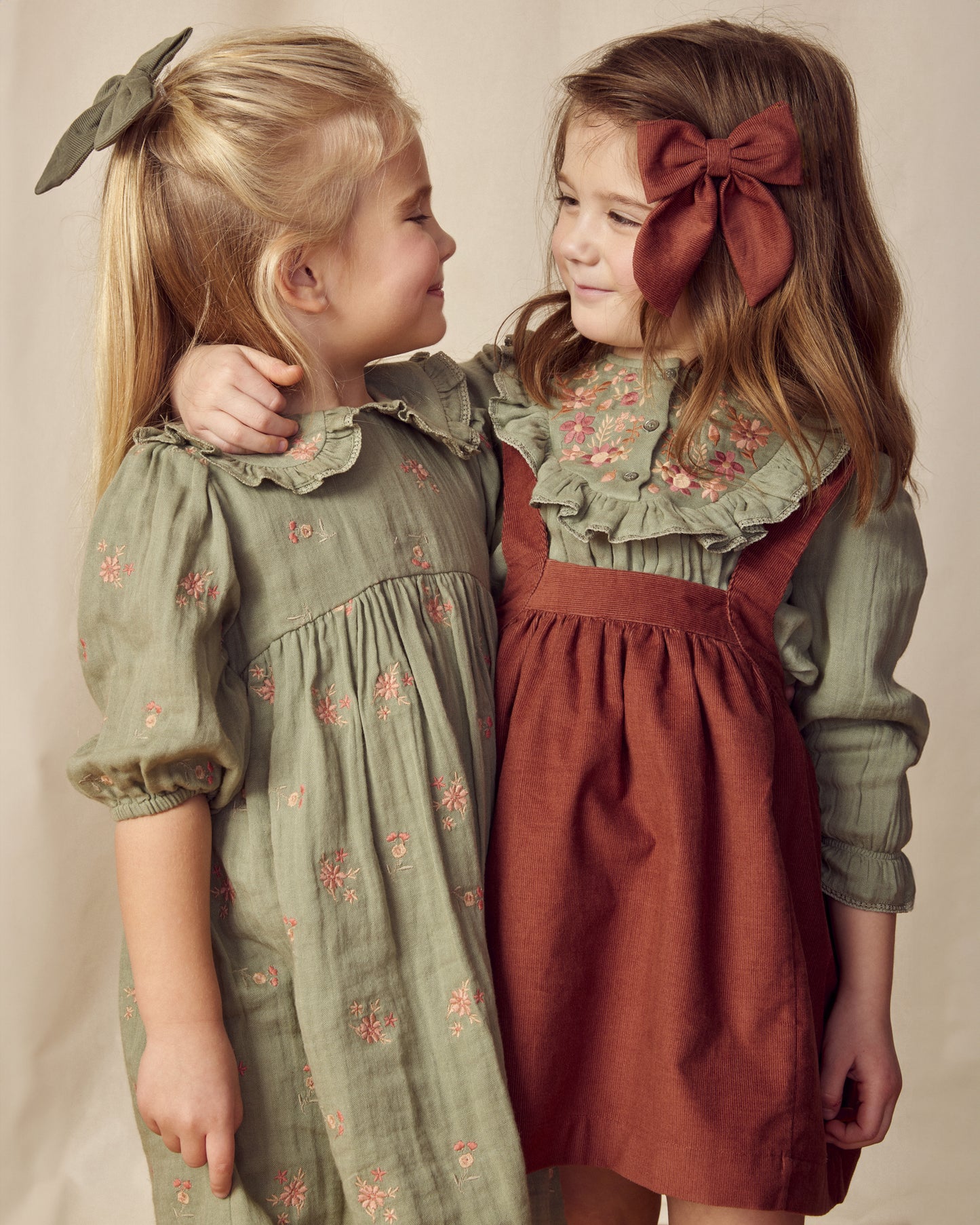 Early Sunday, Annie Skirt in Caramel, made from Cotton Corduroy fabric, featuring a relaxed fit with an elastic waistband & beautiful embroidery, shown in a front view of a models wearing it in a studio setting