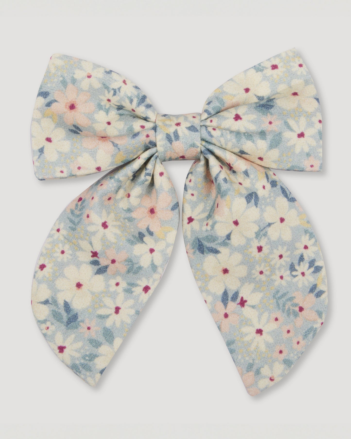 Early Sunday, Audrey Alligator Clip in Amelia print, made from Printed Cotton Cambric fabric, featuring a fabric bow design with a secure hair clip fastening, shown in a front flat-lay view