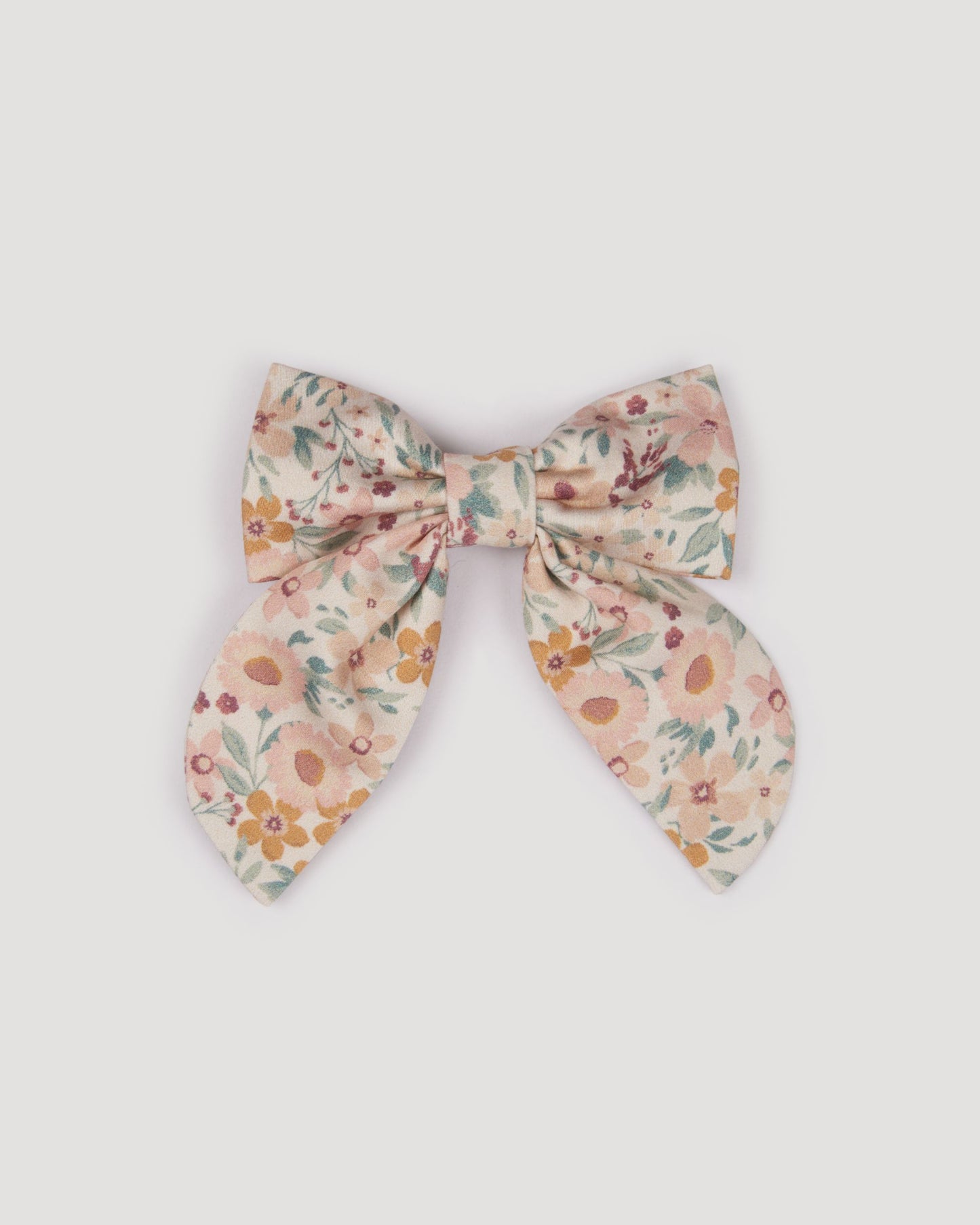 Early Sunday, Audrey Clip in Floral print, made from Printed 60s Cotton Satin fabric, featuring a fabric bow design with a secure hair clip fastening, shown in a front flat-lay view