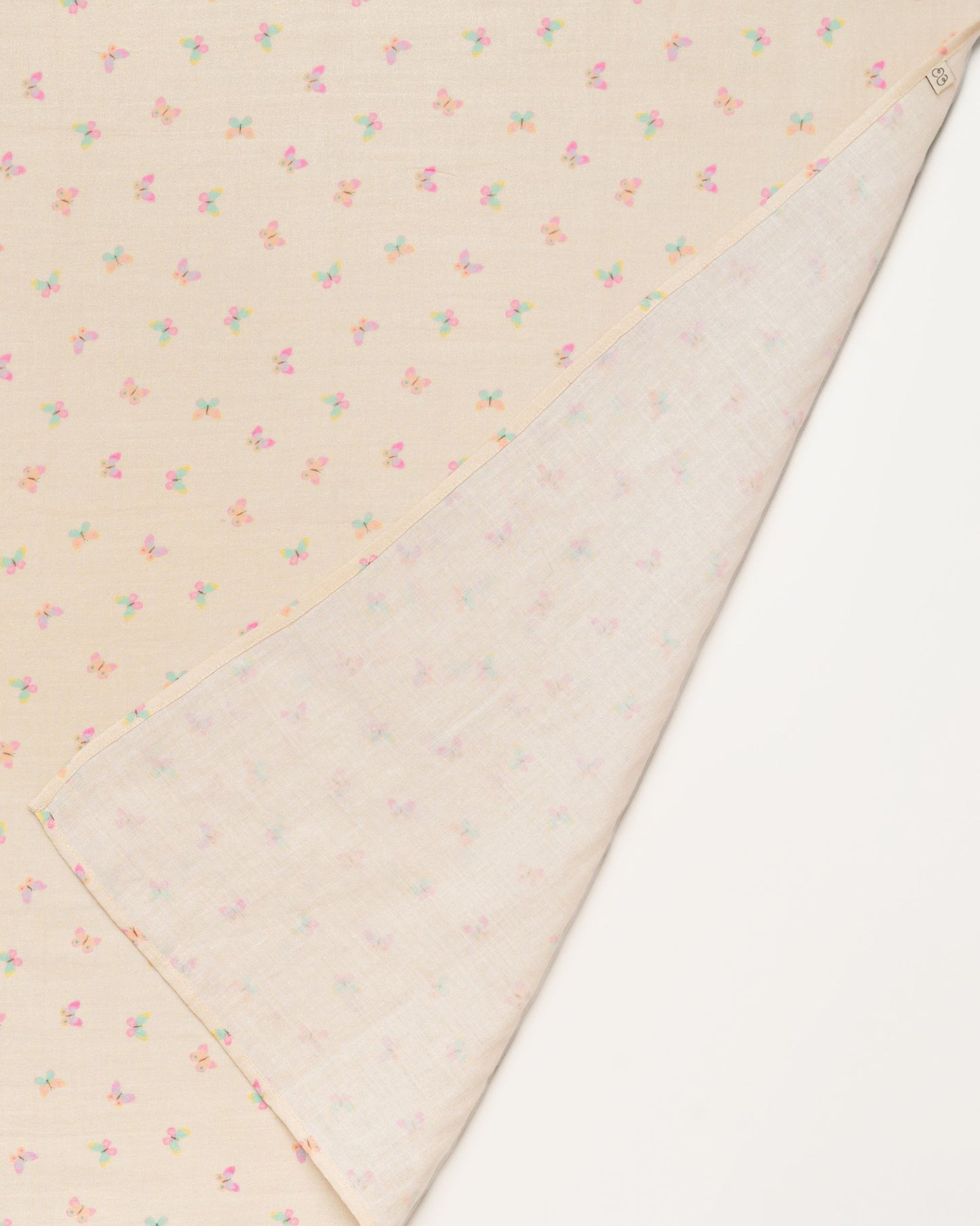 Early Sunday, Baby Napkin in Butterflies print, made from Printed Cotton Double Gauze fabric, shown in a closeup flat-lay view