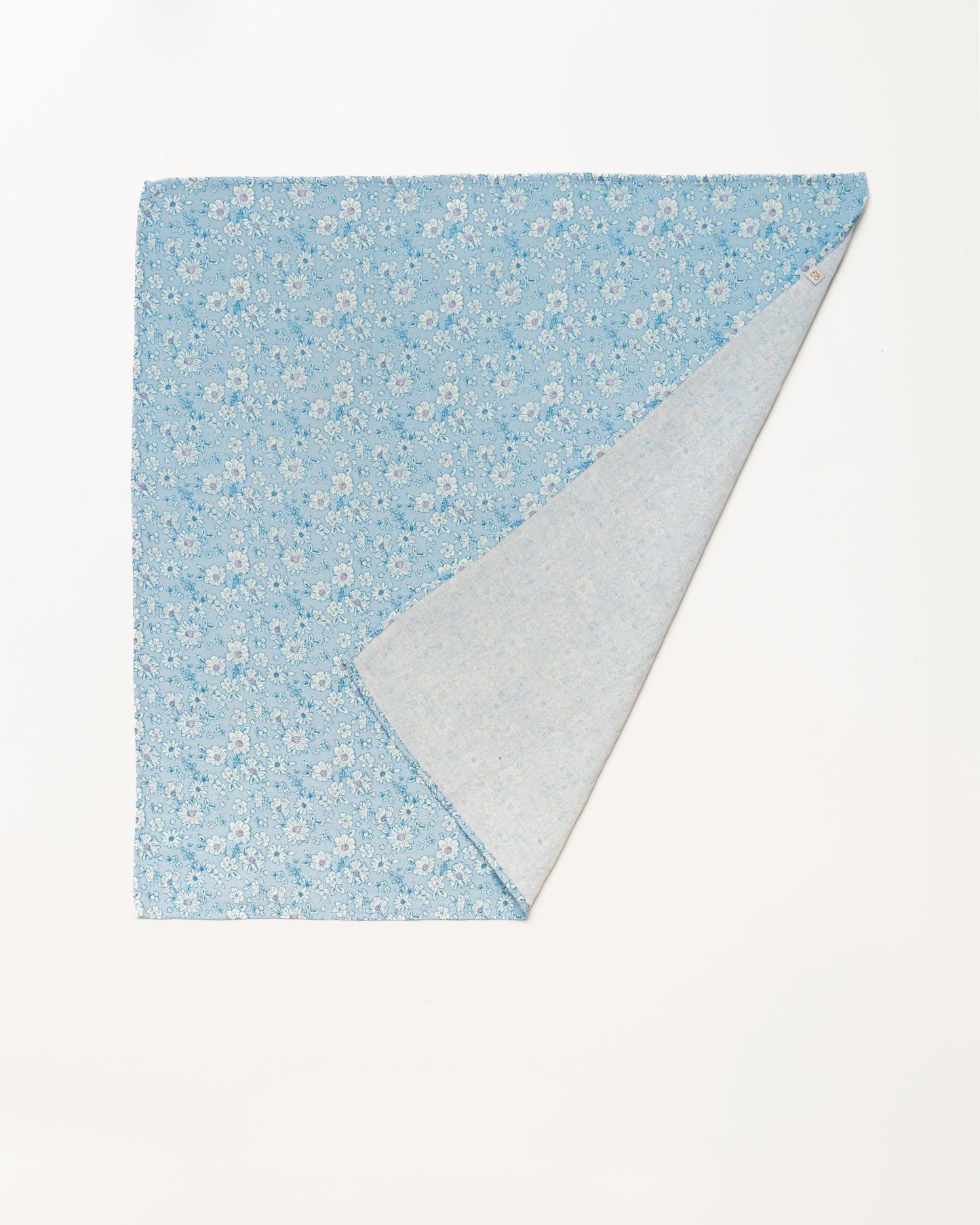 Early Sunday, Baby Napkin in Tonal Floral Blue color, made from Printed Cotton Double Gauze fabric, shown in a back flat-lay view