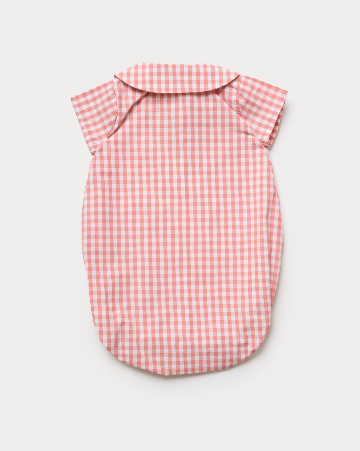 Early Sunday, Bobby Baby Romper in Peony color, made from 100% Cotton Gingham Check fabric, featuring short sleeves with peter pan collar, shown in a back flat-lay view