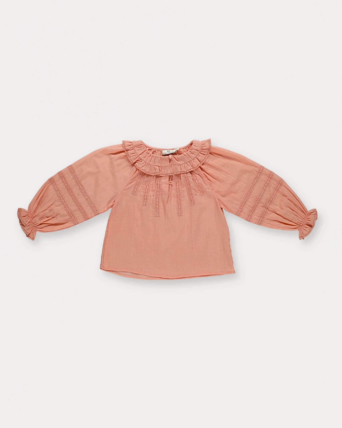 Early Sunday, Cécile Blouse in Blush, made from Cotton Swiss Dobby fabric, featuring a relaxed silhouette with gathered sleeves and delicate detailing, shown in a front flat-lay view