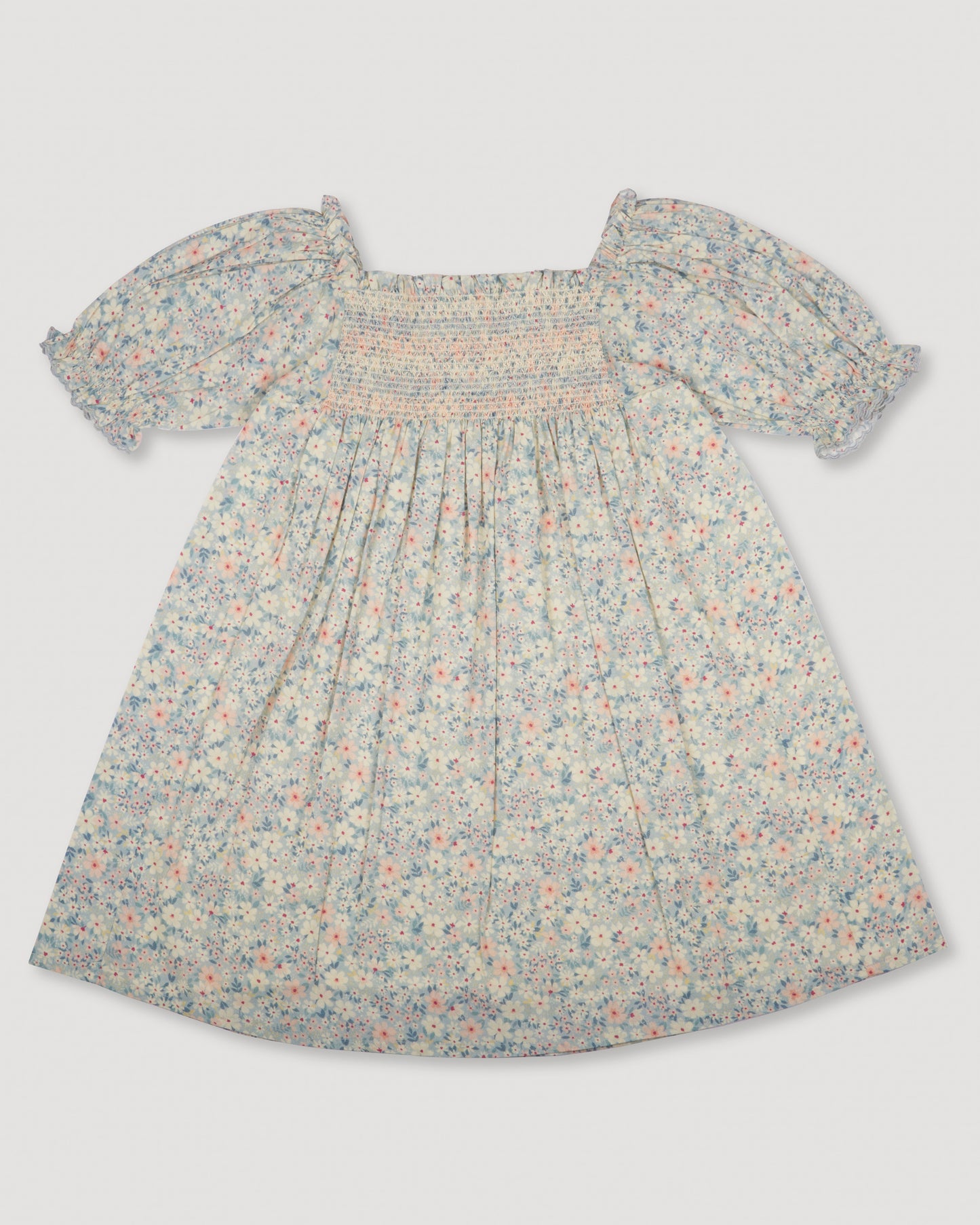 Early Sunday, Caroline Dress in Amelia print, made from Printed Cotton Cambric fabric, featuring tiered silhouette with thoughtful details for a feminine and relaxed look, shown in a back flat-lay view