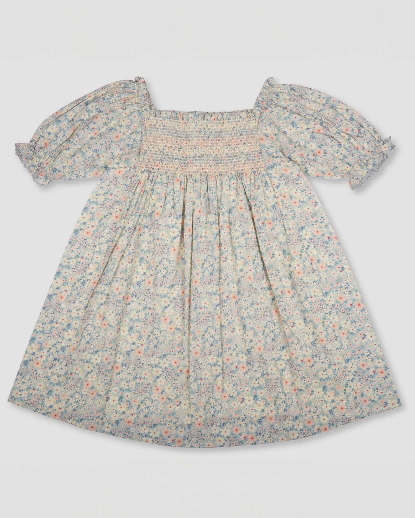 Early Sunday, Caroline Dress in Amelia print, made from Printed Cotton Cambric fabric, featuring tiered silhouette with thoughtful details for a feminine and relaxed look, shown in a front flat-lay view