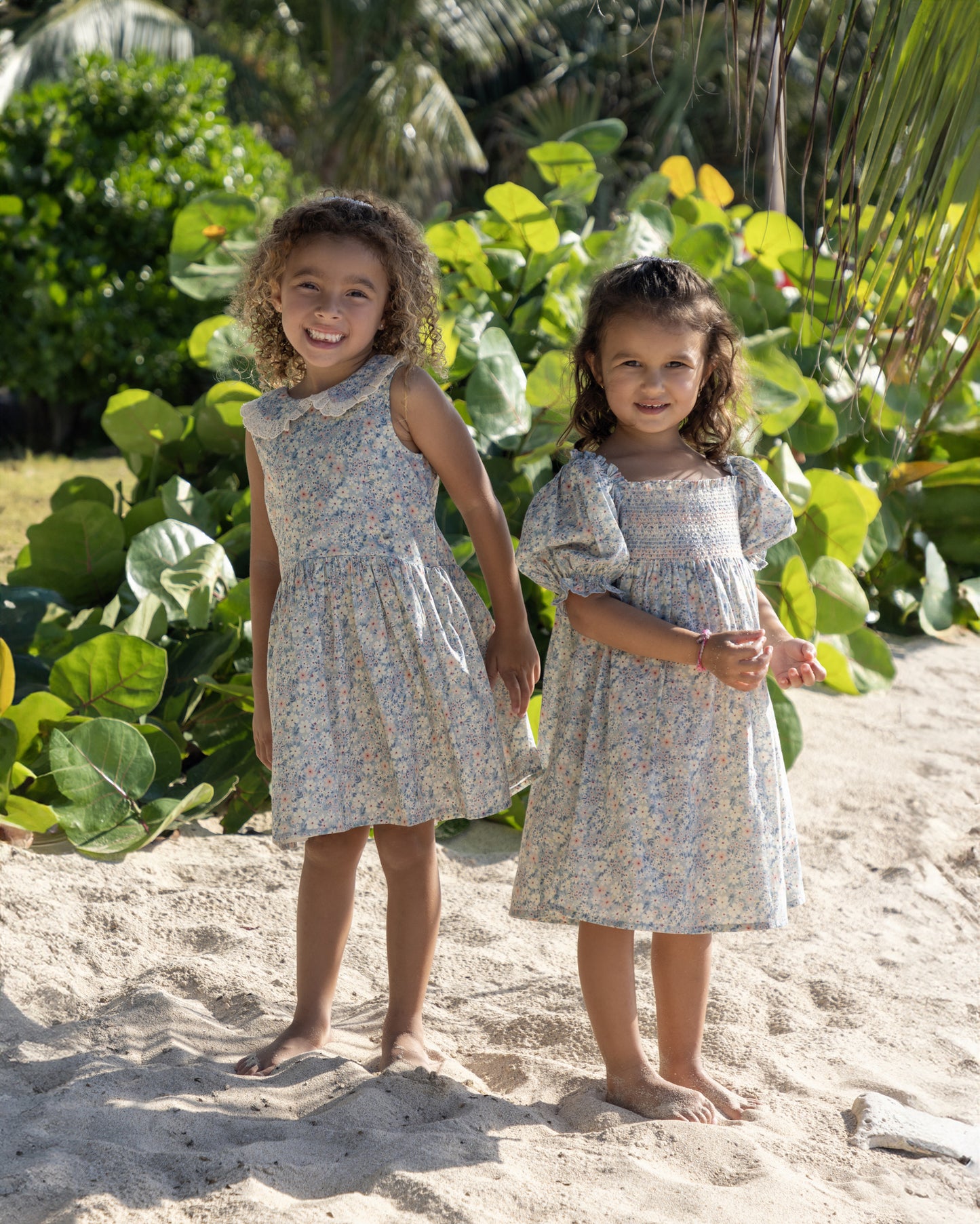 Early Sunday, Caroline Dress in Amelia print, made from Printed Cotton Cambric fabric, featuring tiered silhouette with thoughtful details for a feminine and relaxed look, shown in a front view of model wearing it