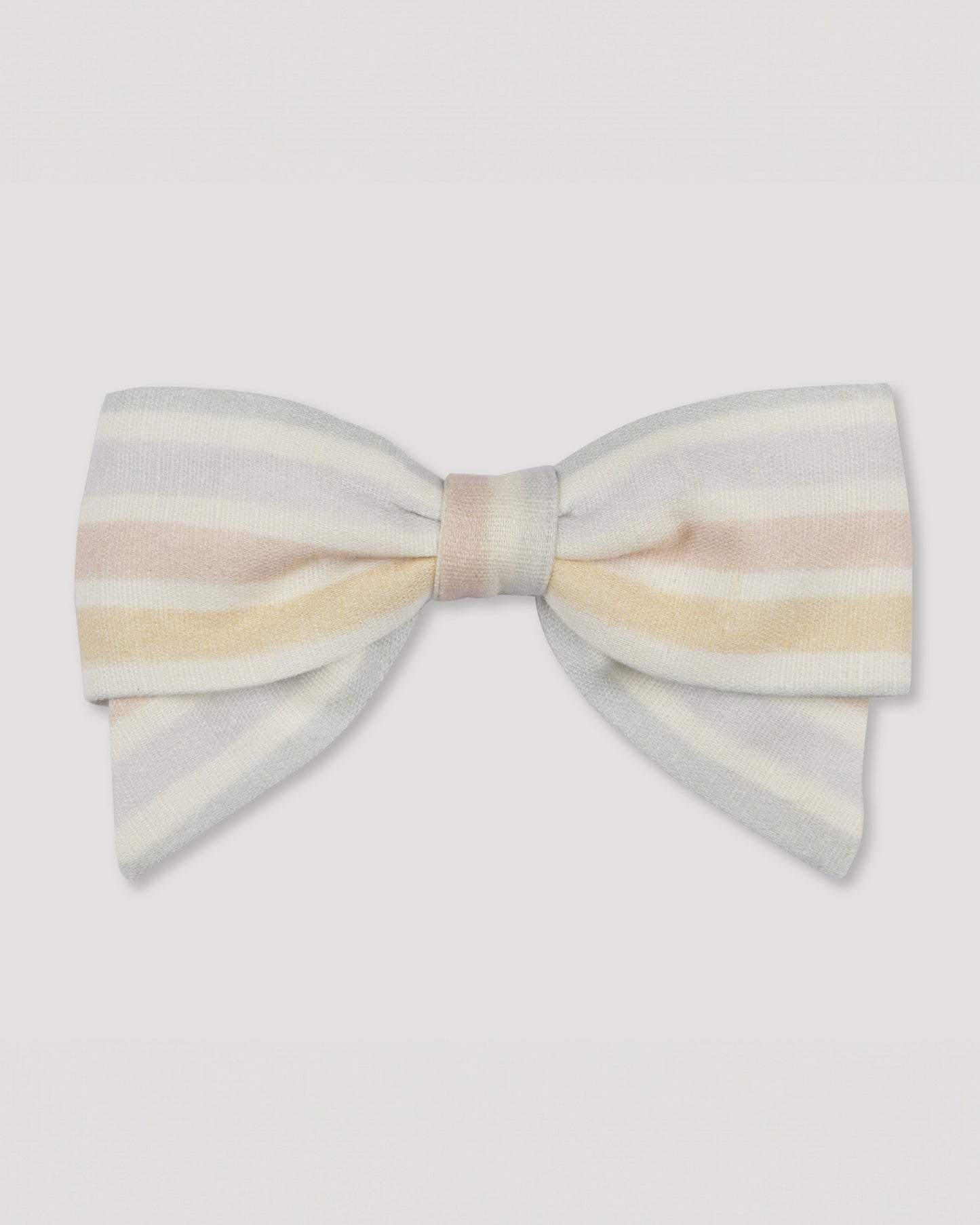 Early Sunday, Chiara Alligator Clip in Mini Flower print, made from Printed canvas 70% Cotton 30% Linen fabric, featuring a bow design on an alligator clip with a secure fit, shown in a front flat-lay view