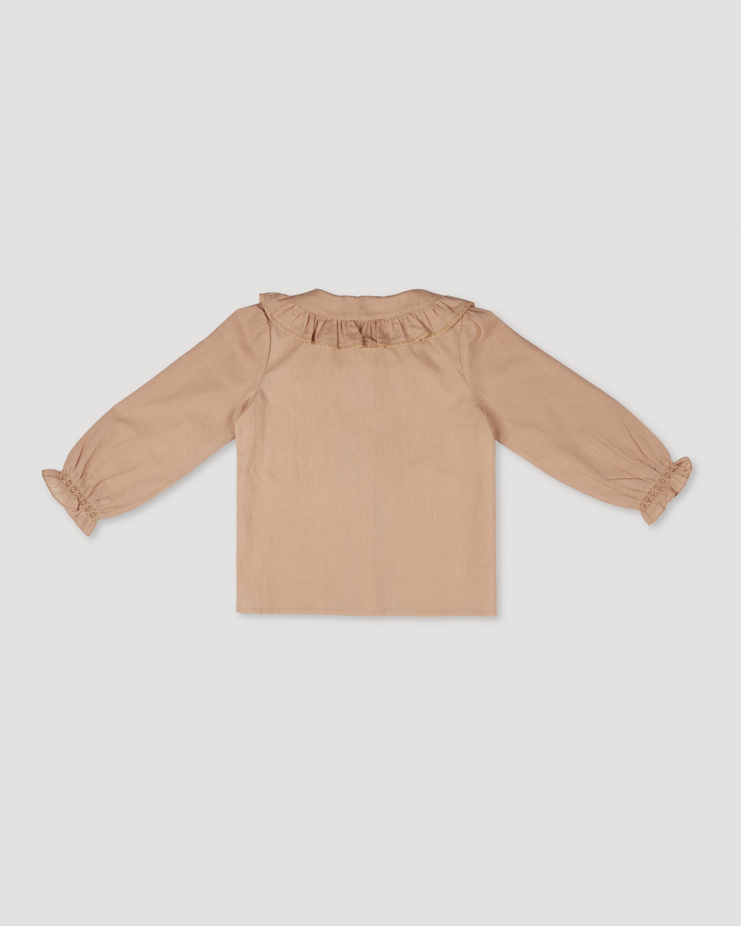 Early Sunday, Ella Blouse in Nude, made from Cotton Cambric fabric, featuring relaxed fit, frill detailing on the collar, and lace inserts, shown in a back flat-lay view