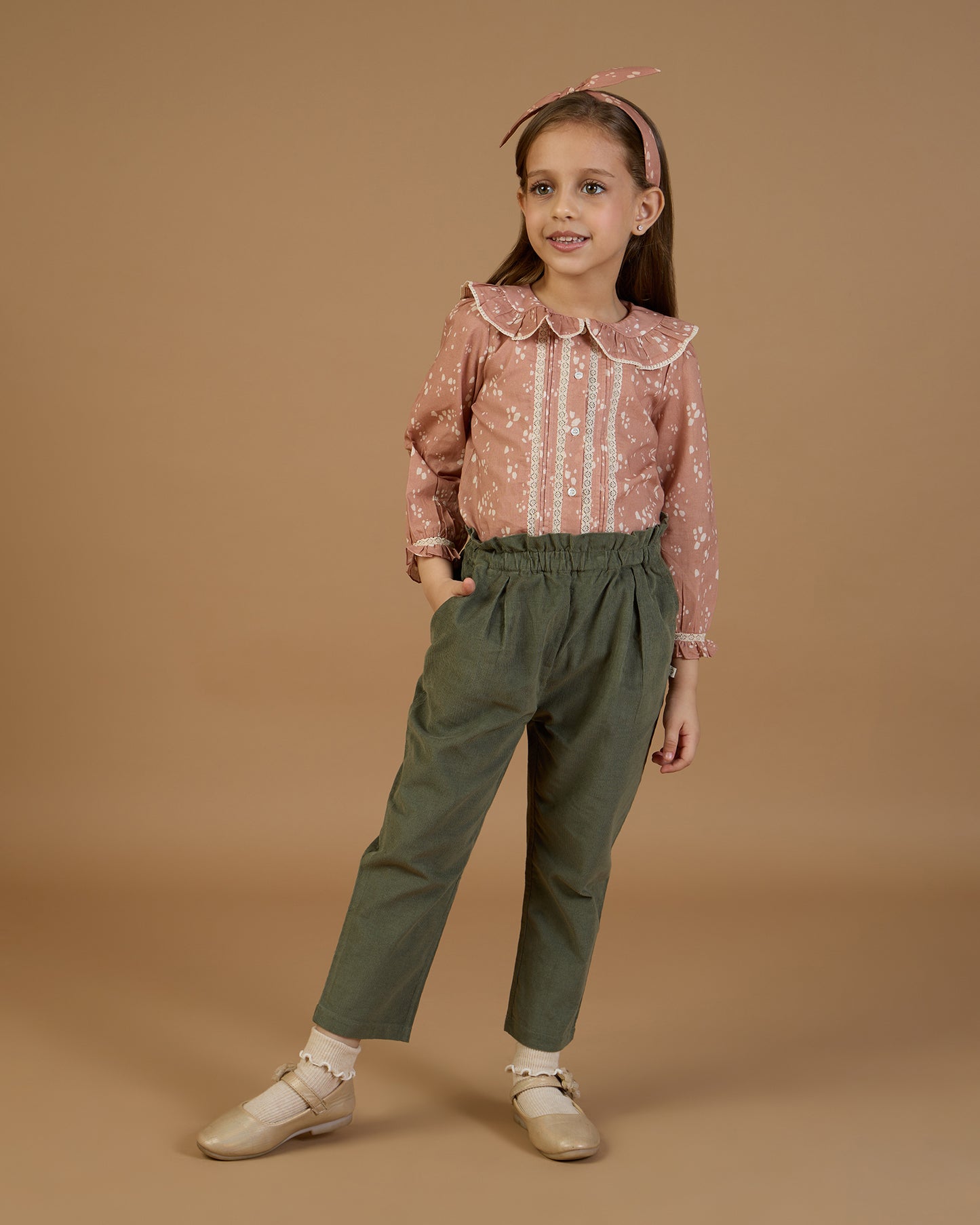 Early Sunday, Ella Blouse in Fawn Soft Pinkish Brown, made from Printed Cotton Cambric fabric, featuring relaxed fit, frill detailing on the collar, and lace inserts, shown in a front view of model wearing it
