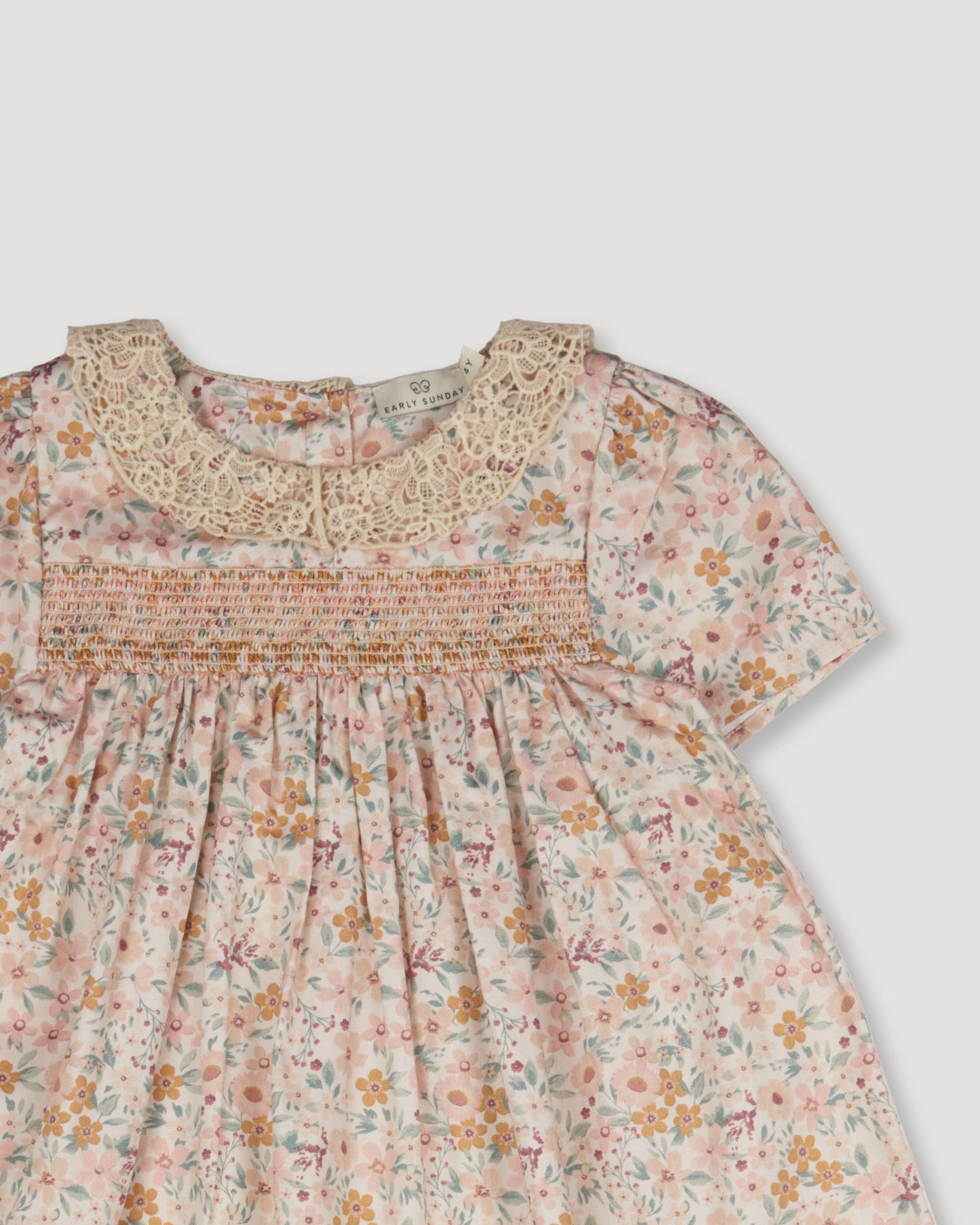 Early Sunday, Erika Dress in Floral print, made from Printed Cotton Satin fabric, featuring Flowy A-line silhouette allows ease of movement and day-long comfort, shown in a closeup flat-lay view