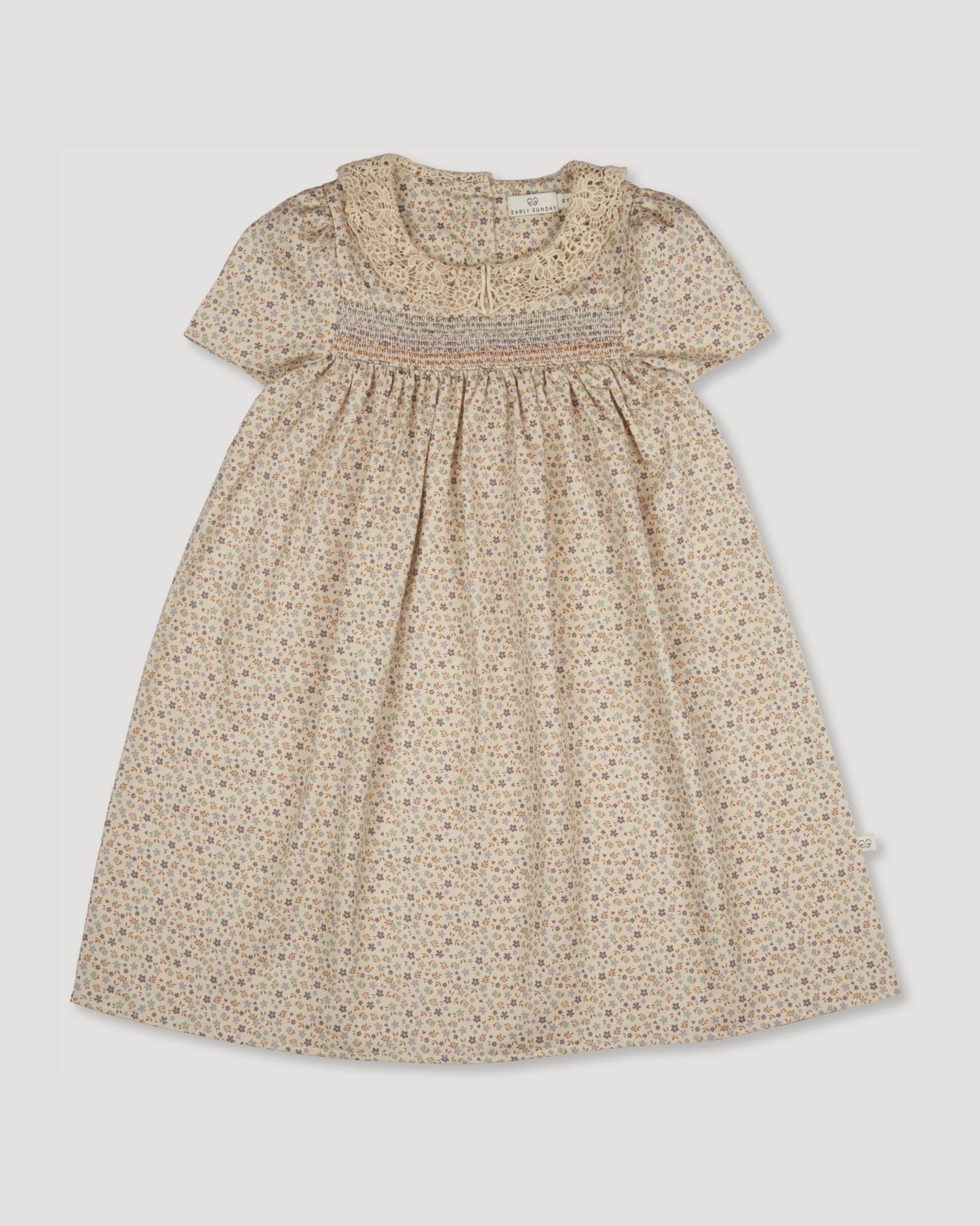 Early Sunday, Erika Dress in Miny Flowers print, made from Printed Cotton Satin fabric, featuring Flowy A-line silhouette allows ease of movement and day-long comfort, shown in a front flat-lay view