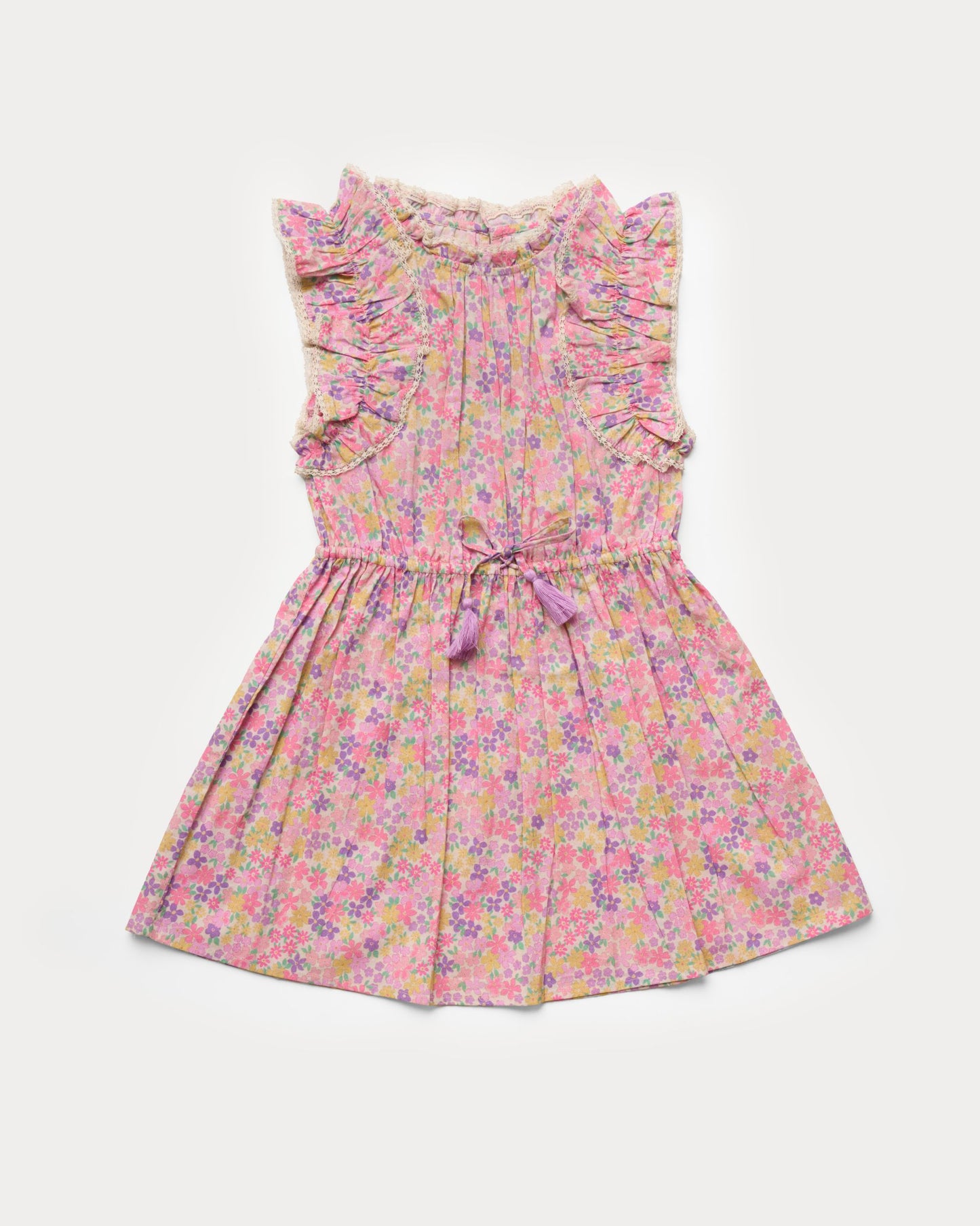 Early Sunday, Florence Dress in Emma Floral Purple color, made from printed cotton cambric fabric, featuring Ruffle detailing on the yoke and sleeves, lace accents, gathered waist with tassel tie, shown in a front flat-lay view