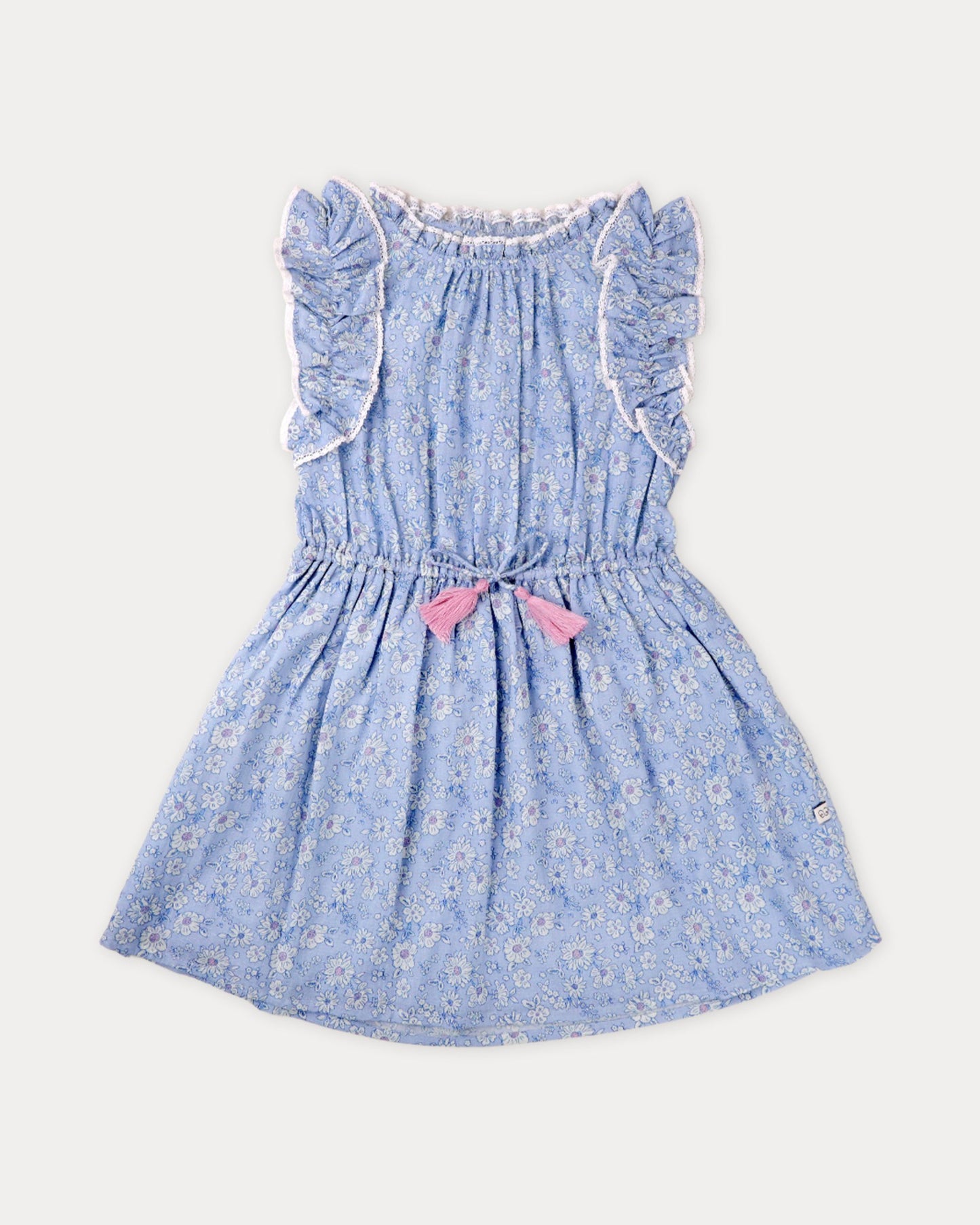 Early Sunday, Florence Dress in Tonal Floral Blue color, made from printed cotton tiny swiss dobby fabric, featuring Ruffle detailing on the yoke and sleeves, lace accents, gathered waist with tassel tie, shown in a front flat-lay view