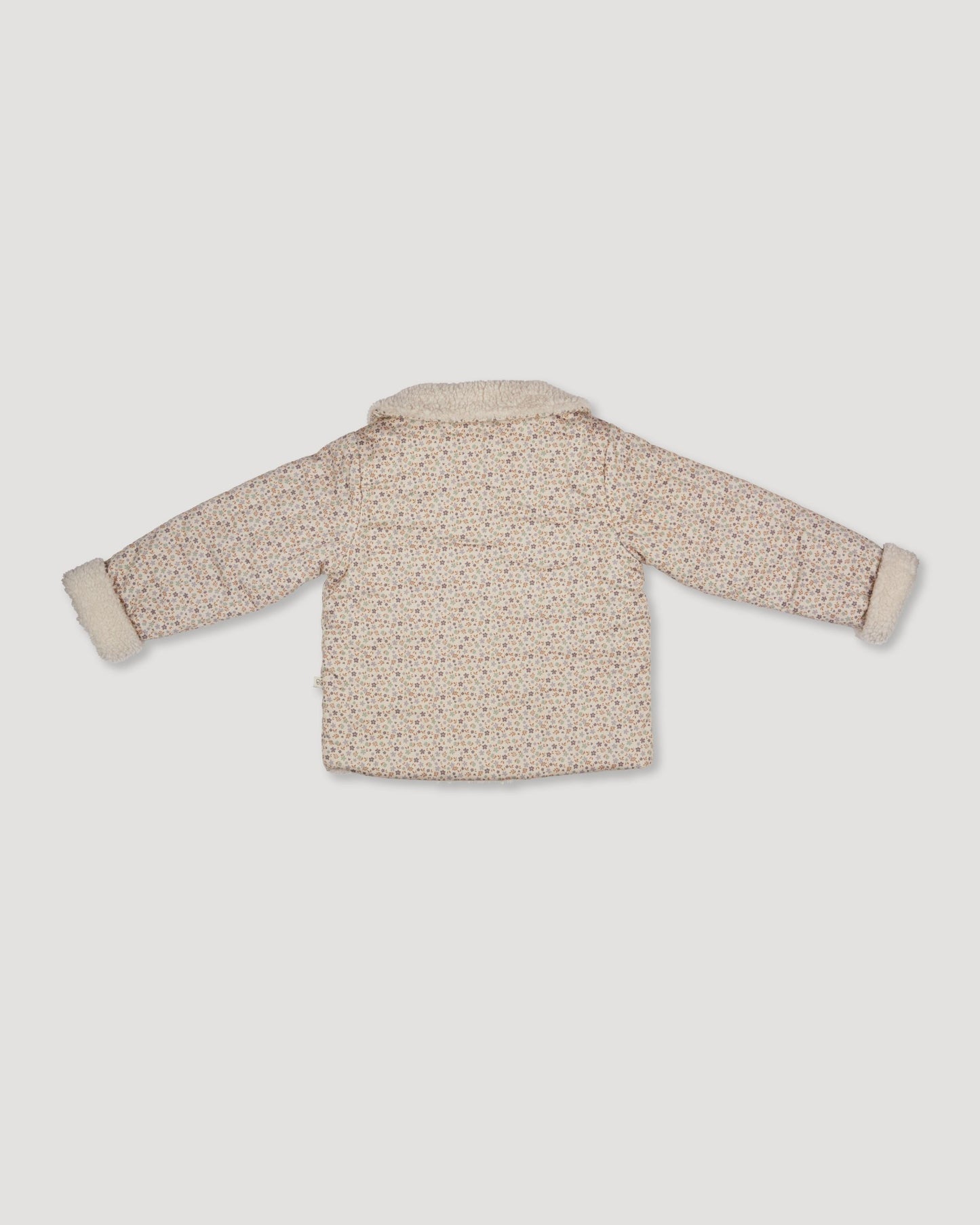 Early Sunday, Franka Jacket in Miny Flowers print, made from Printed 30s Cotton Twill fabric, featuring Cozy, softly structured jacket with a plush sherpa lining and gentle detailing for warmth without bulk, shown in a back flat-lay view
