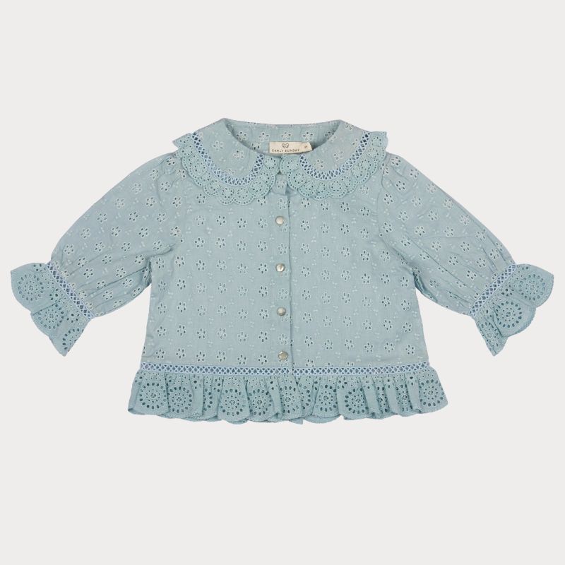 Early Sunday, Iris Blouse in Sea Dream color, made from All-Over Eyelet Embroidered Cotton Schifflie fabric, featuring relaxed fit with delicate detailing for a timeless and feminine look, shown in a front flat-lay view