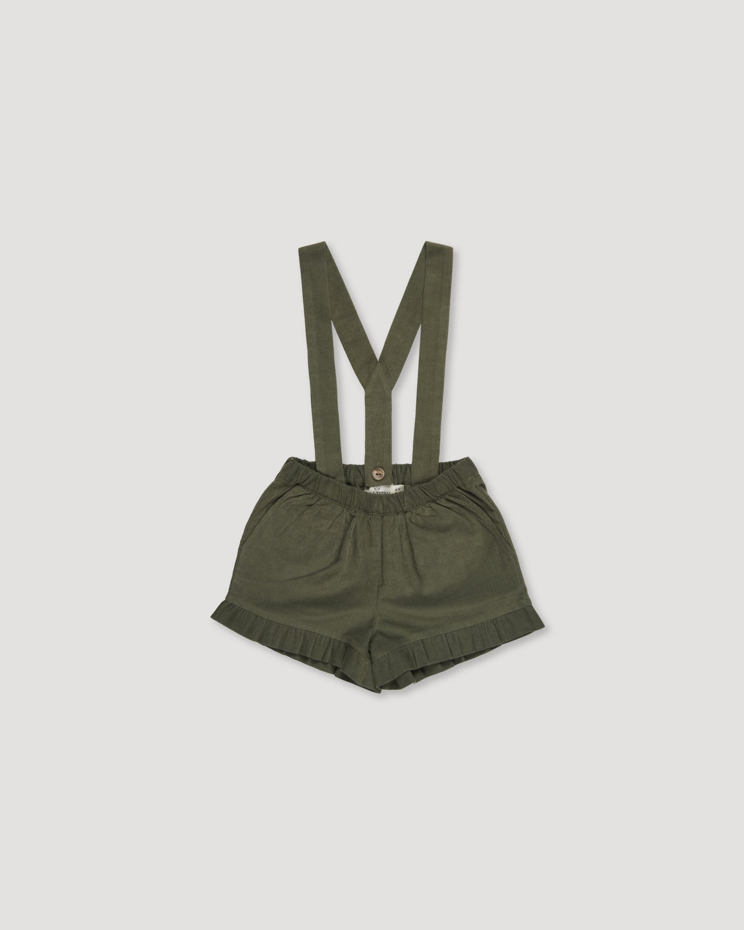 Early Sunday, Joseph Short Dungaree in Moss, made from Cotton Corduroy fabric, featuring short dungaree with adjustable straps, shown in a back flat-lay view