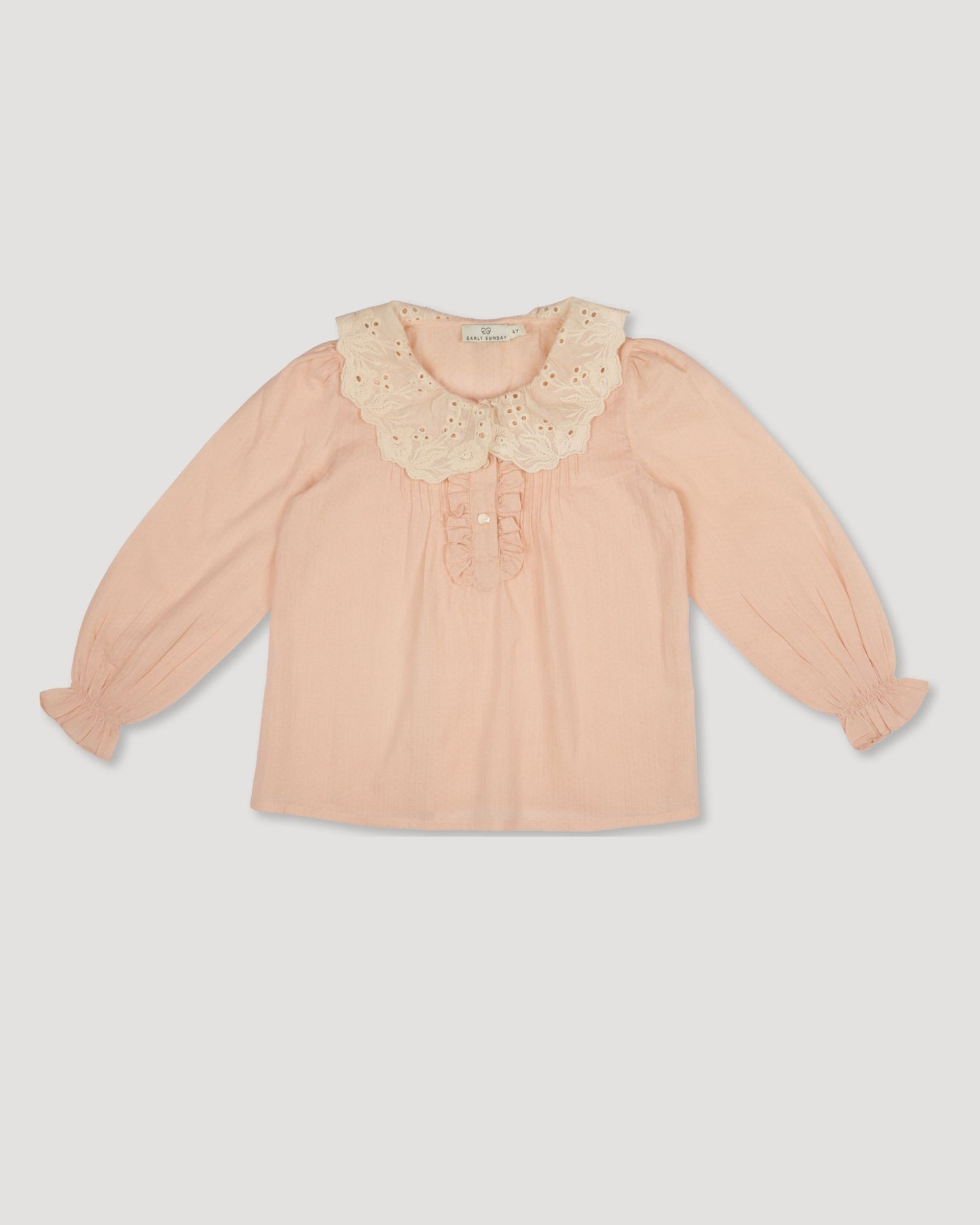 Early Sunday, Julianne Blouse in Nude, made from Dyed Cotton Swiss Dobby Tiny Dots fabric, featuring Comfort-first design with a playful silhouette, shown in a front flat-lay view