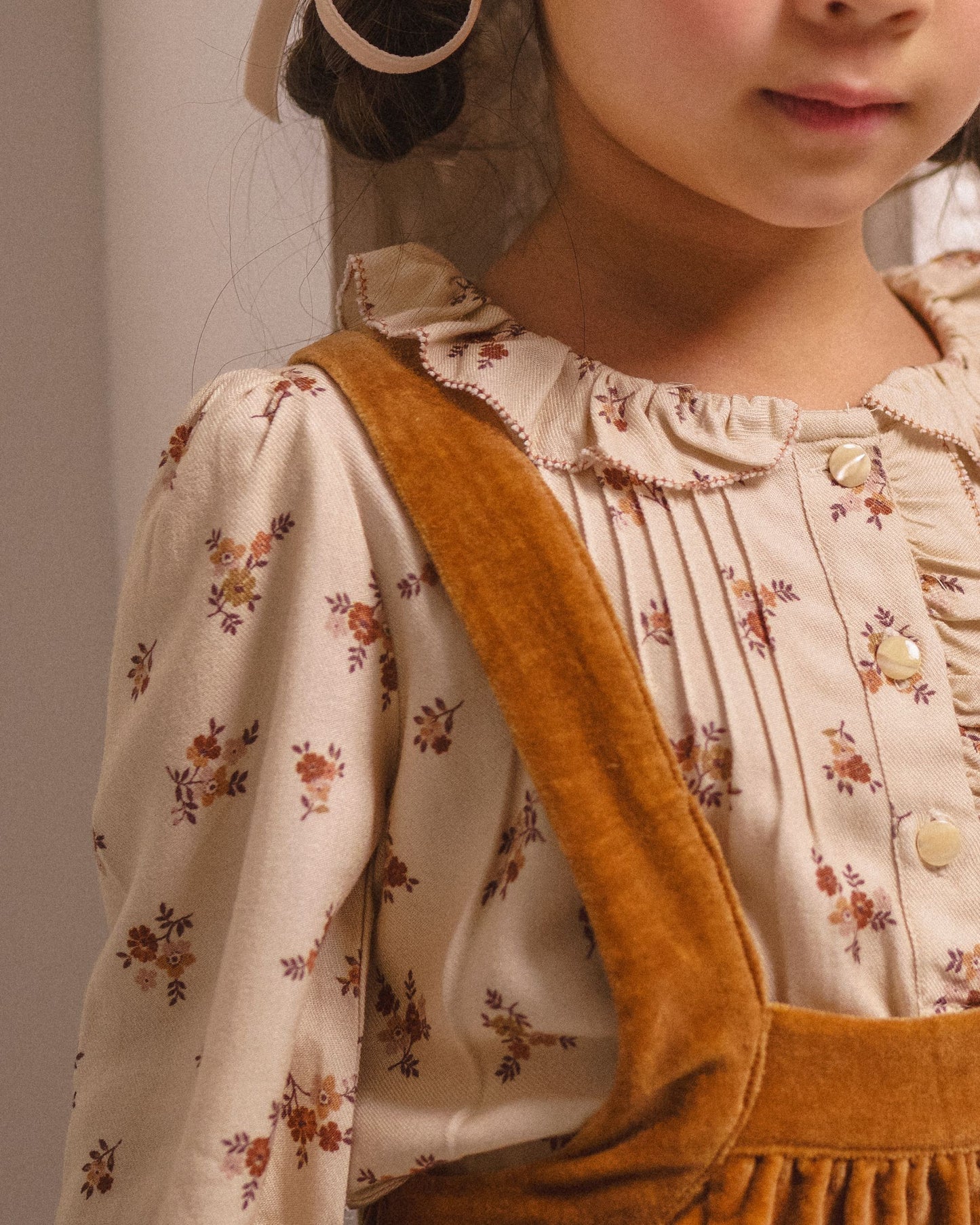 Early Sunday, Julianne Blouse in Ditsy Bouquet Cream print, made from Printed Viscose Rayon Twill fabric, featuring Comfort-first design with a playful silhouette, shown in a close-up shot of the print