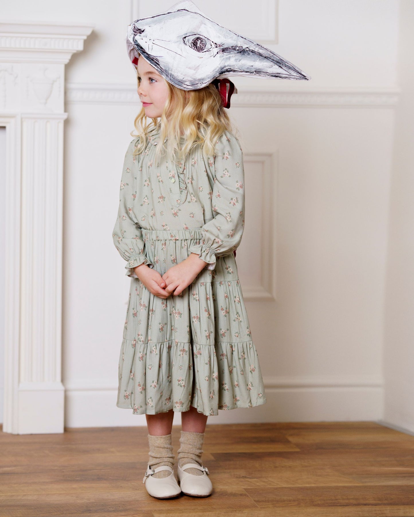 Early Sunday, Julianne Blouse in Ditsy Bouquet Jade print, made from Printed Viscose Rayon Twill fabric, featuring Comfort-first design with a playful silhouette, shown in a front view of a model wearing it in a studio setting