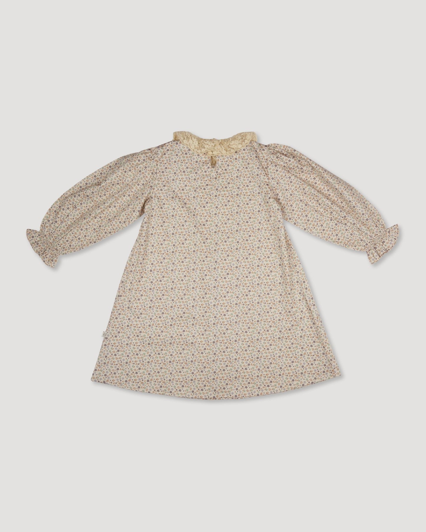 Early Sunday, Julie Dress in Miny Flowers print, made from Printed Cotton Satin fabric, featuring Delicate lace collar paired with a softly structured silhouette for a refined, timeless finish, shown in a back flat-lay view