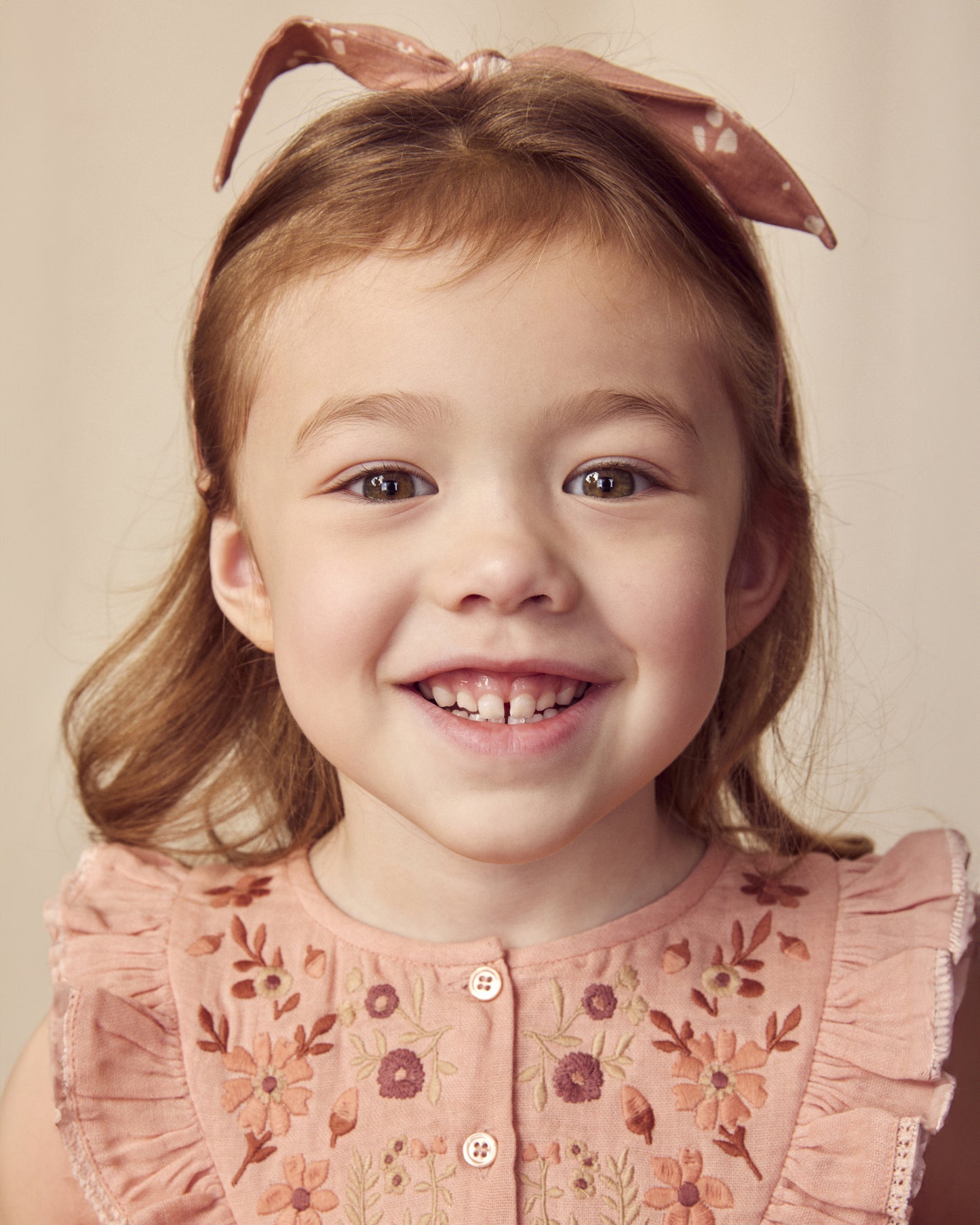 Early Sunday, Lauren Blouse in Dusty Pink, made from Cotton Double Gauze fabric, featuring relaxed fit with a floral embroidered yoke, shown in a close up shot of model wearing