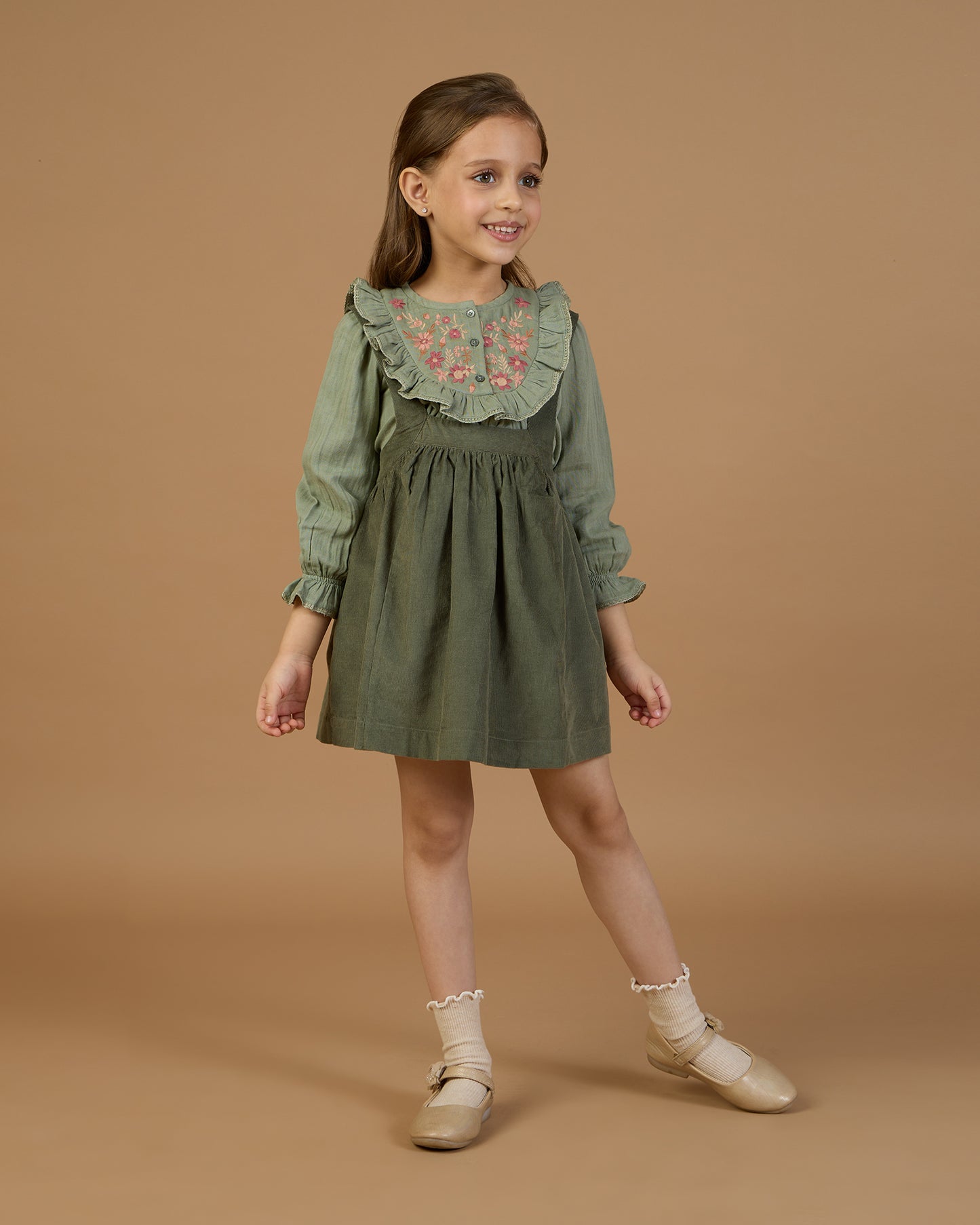 Early Sunday, Lauren Blouse in Halcyon Green color, made from Cotton Double Gauze fabric, featuring relaxed fit with a floral embroidered yoke, shown in front view of model wearing it