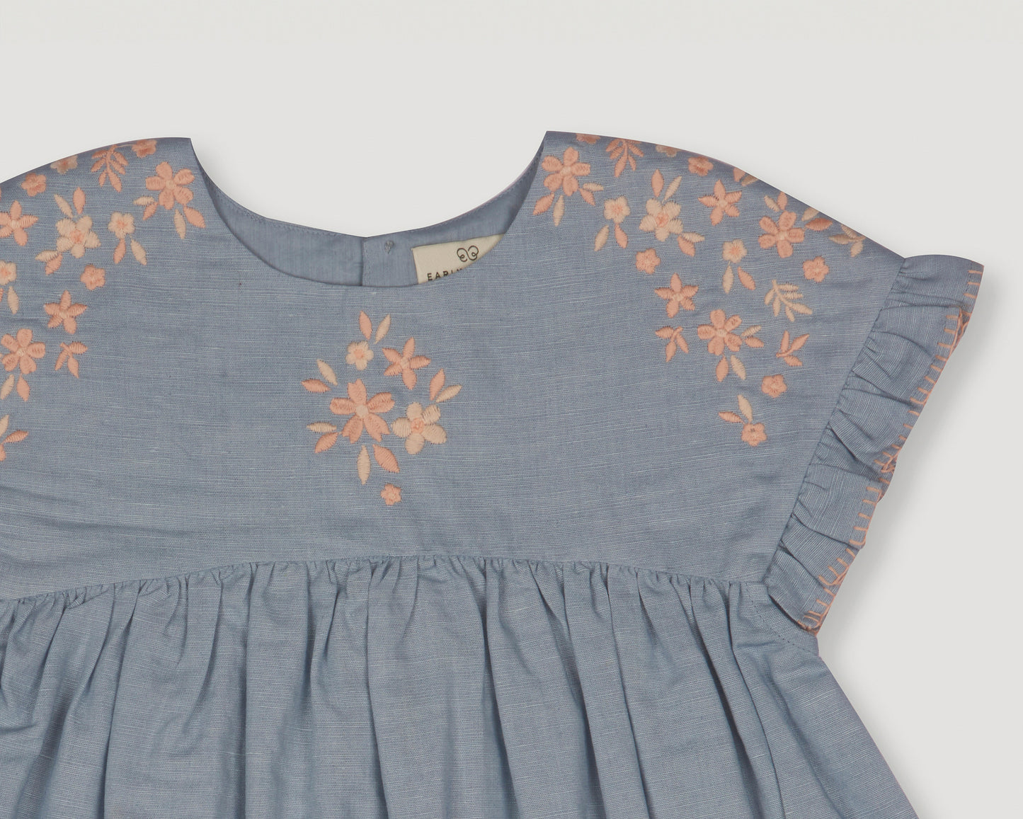 Early Sunday, Lila Dress in Ocean Blue color, made from Canvas 70% Cotton 30% Linen fabric, featuring a flattering mini dress with a relaxed fit, designed for comfort and effortless style, shown in closeup flat-lay view