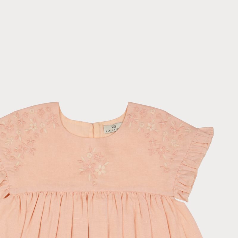 Early Sunday, Lila Dress in Pink Sand color, made from Canvas 70% Cotton 30% Linen fabric, featuring a flattering mini dress with a relaxed fit, designed for comfort and effortless style, shown in a closeup flat-lay view