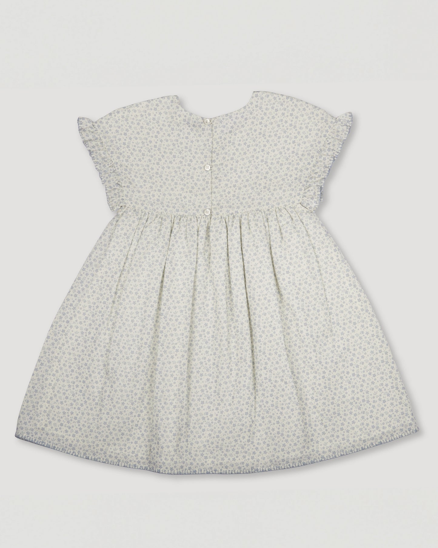 Early Sunday, Lila Dress in Mini Flower print, made from Printed canvas 70% Cotton 30% Linen fabric, featuring a flattering mini dress with a relaxed fit, designed for comfort and effortless style, shown in a back flat-lay view