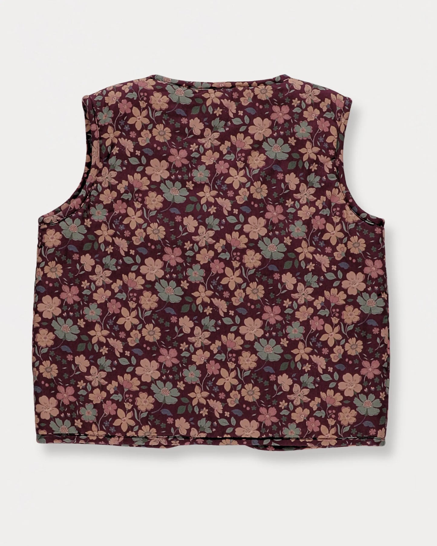 Early Sunday, Lou Vest jacket in Plum, made from Printed Cotton Satin fabric, featuring sleeveless quilted silhouette with tie-up bow detailing, shown in a back flat-lay view
