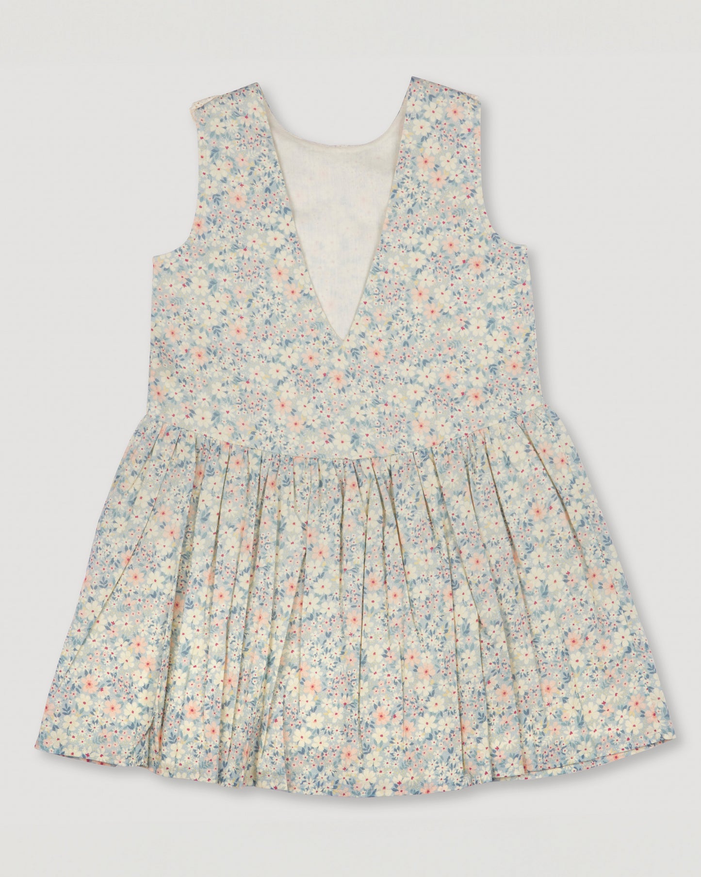Early Sunday, LYS Dress in Amelia print, made from Printed Cotton Cambric fabric, featuring flattering fit with delicate finishes, combining style and functionality for an effortlessly elegant look, shown in a back flat-lay view