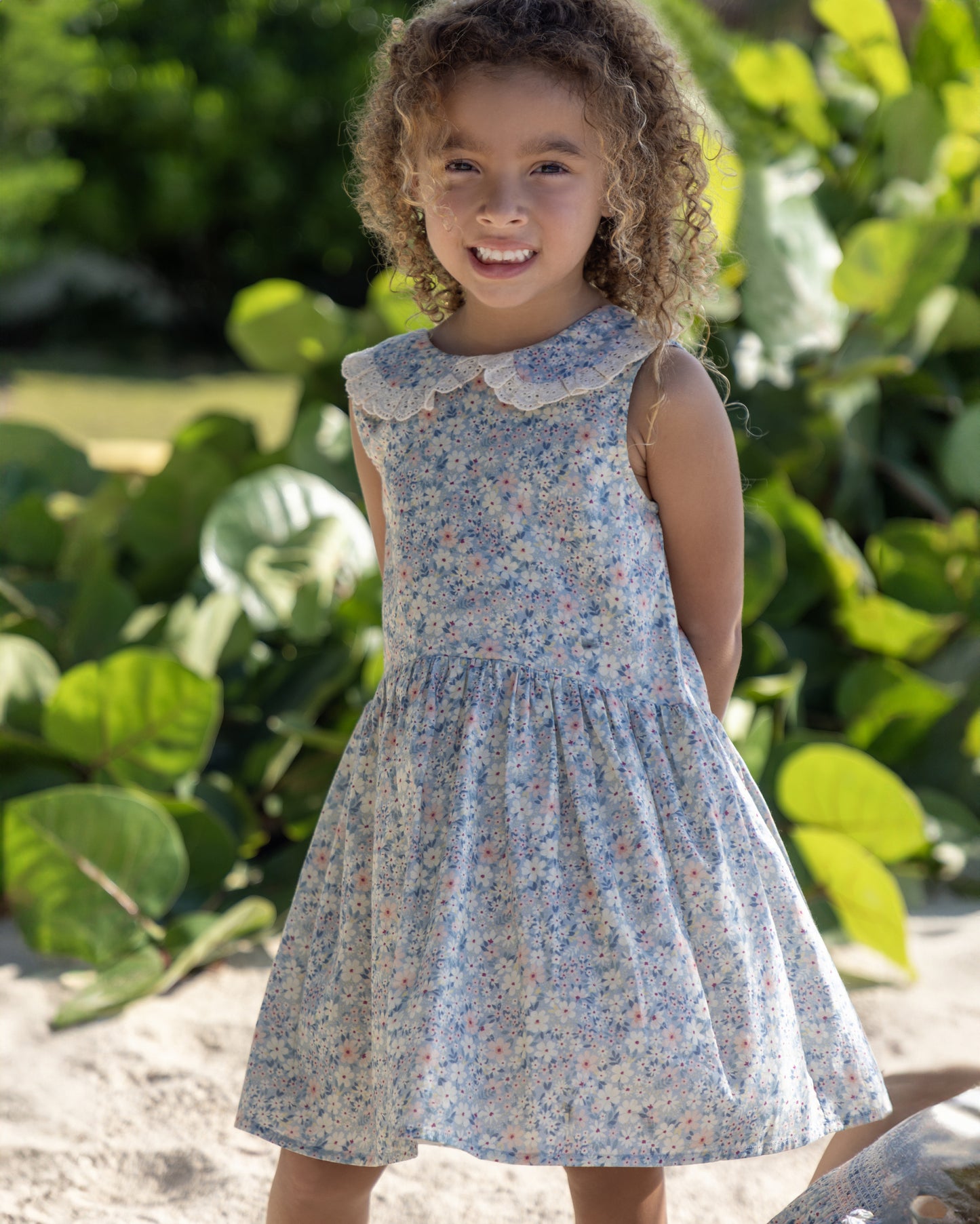 Early Sunday, LYS Dress in Amelia print, made from Printed Cotton Cambric fabric, featuring flattering fit with delicate finishes, combining style and functionality for an effortlessly elegant look, shown in a front view of model wearing it