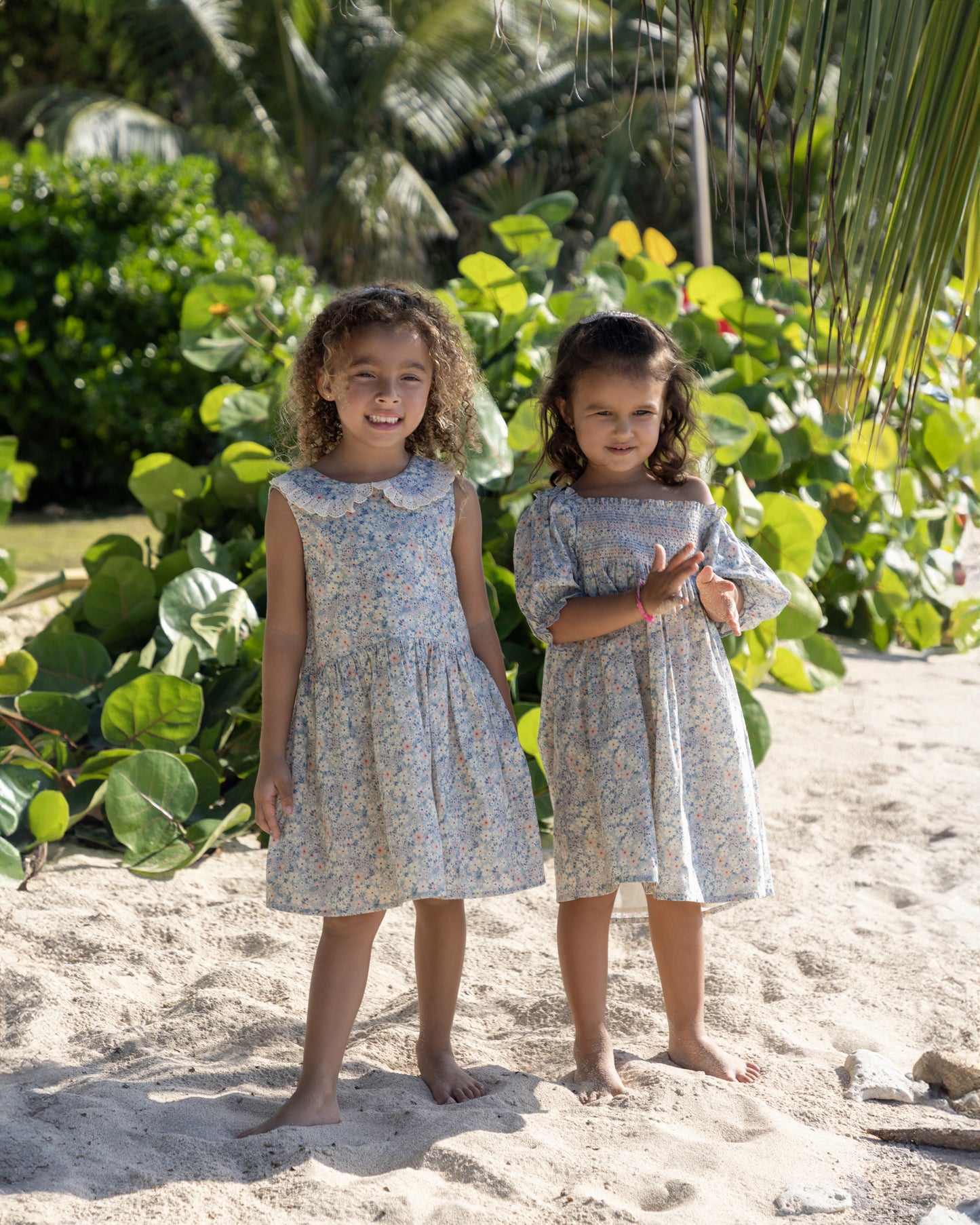 Early Sunday, LYS Dress in Amelia print, made from Printed Cotton Cambric fabric, featuring flattering fit with delicate finishes, shown in a front view of models wearing outdoors