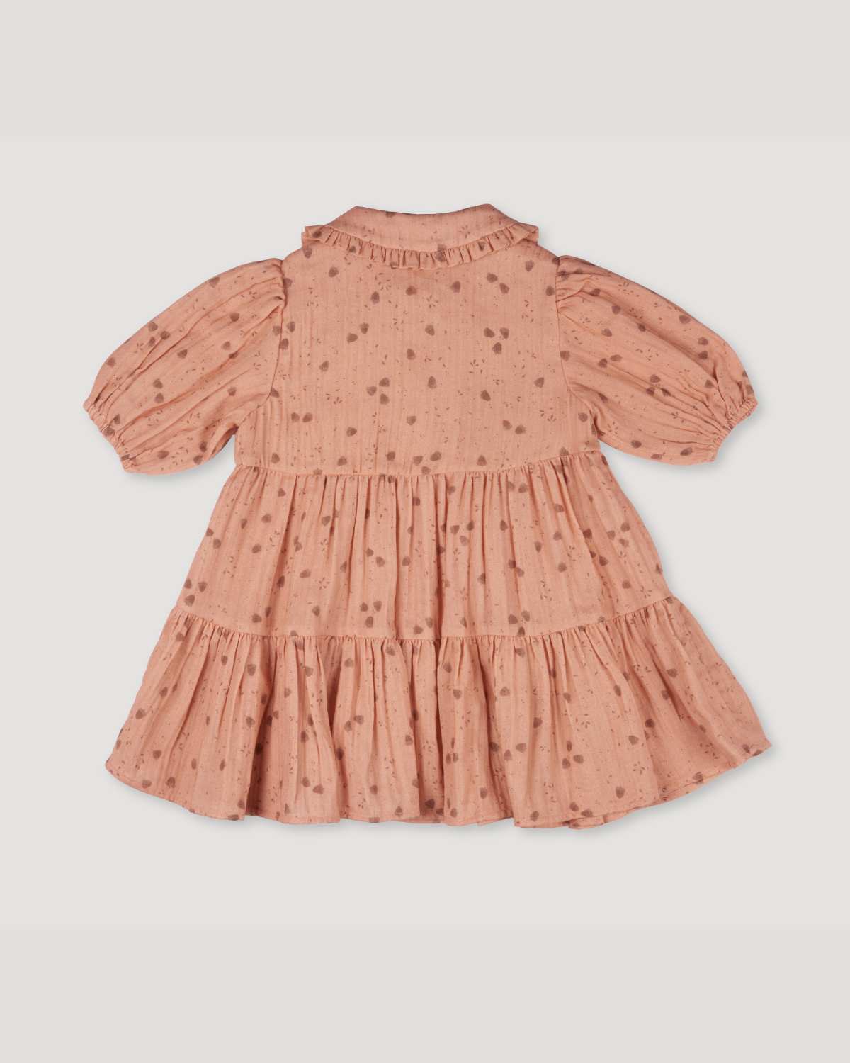 Early Sunday, Marguerite Dress in Acorn Dusty Pink, made from Printed Cotton Double Gauze fabric, featuring classic silhouette with a collar and ruffle detailing, shown in a back flat-lay view