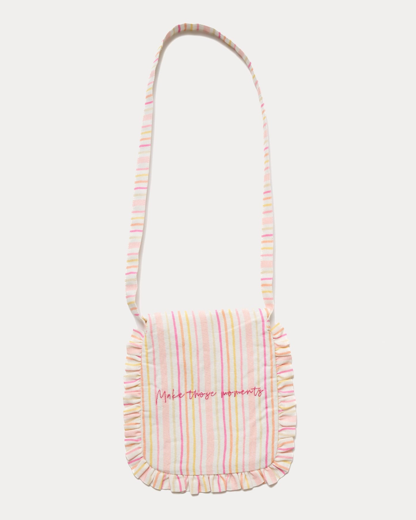 Early Sunday, Miss Sunday Sling in Pink Stripes print, made from 70% Cotton, 30% Linen fabric, featuring a frill detailed sling purse with flap closure, shown in a back flat-lay view