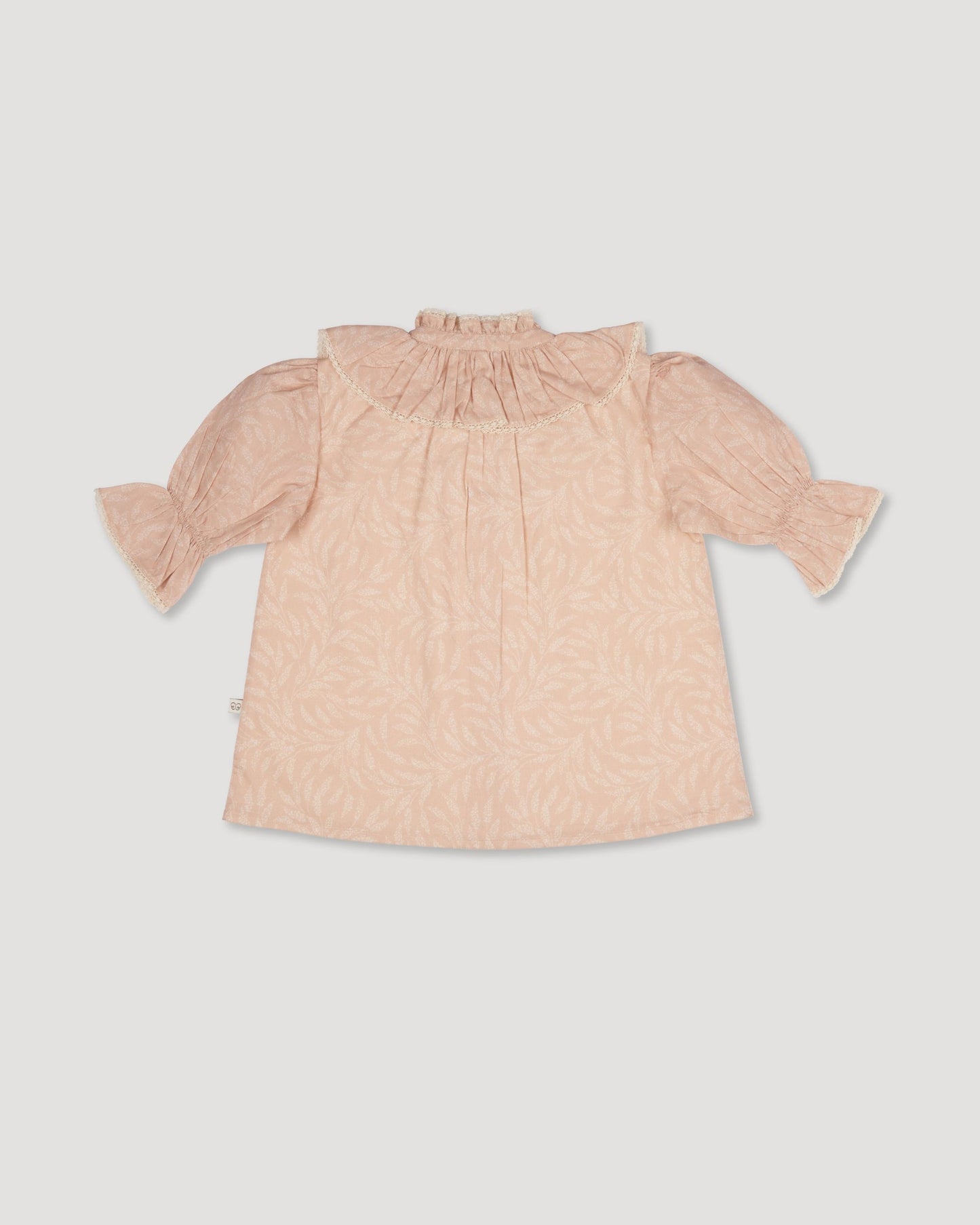 Early Sunday, Ophelie Blouse in Feather print, made from Printed Cotton Cambric fabric, featuring Comfort-first design with a playful silhouette and French seams, shown in a back flat-lay view
