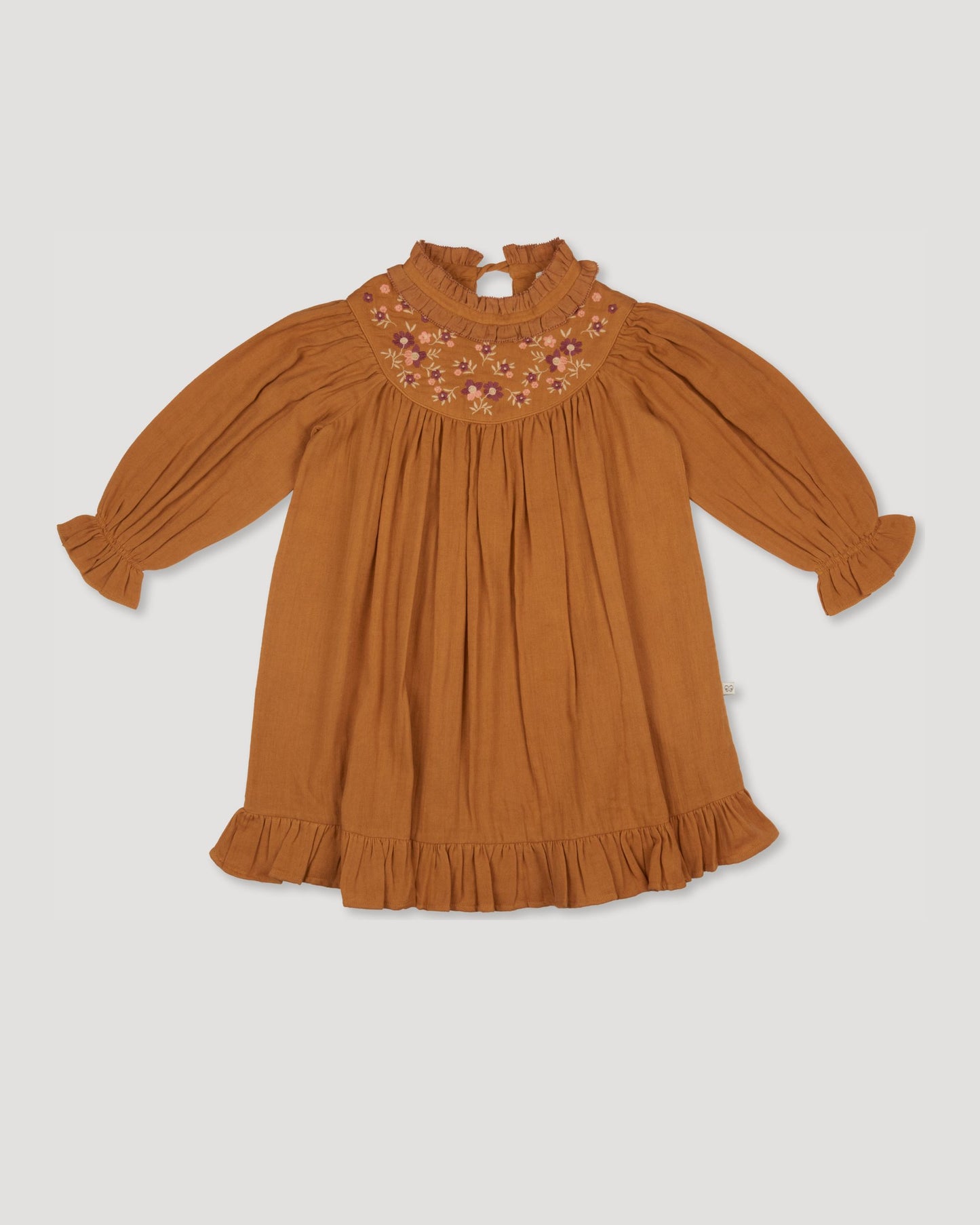 Early Sunday, Penelope Dress in Almond, made from Dyed Cotton Double Gauze fabric, featuring Hand-embroidered floral motifs, shown in a front flat-lay view