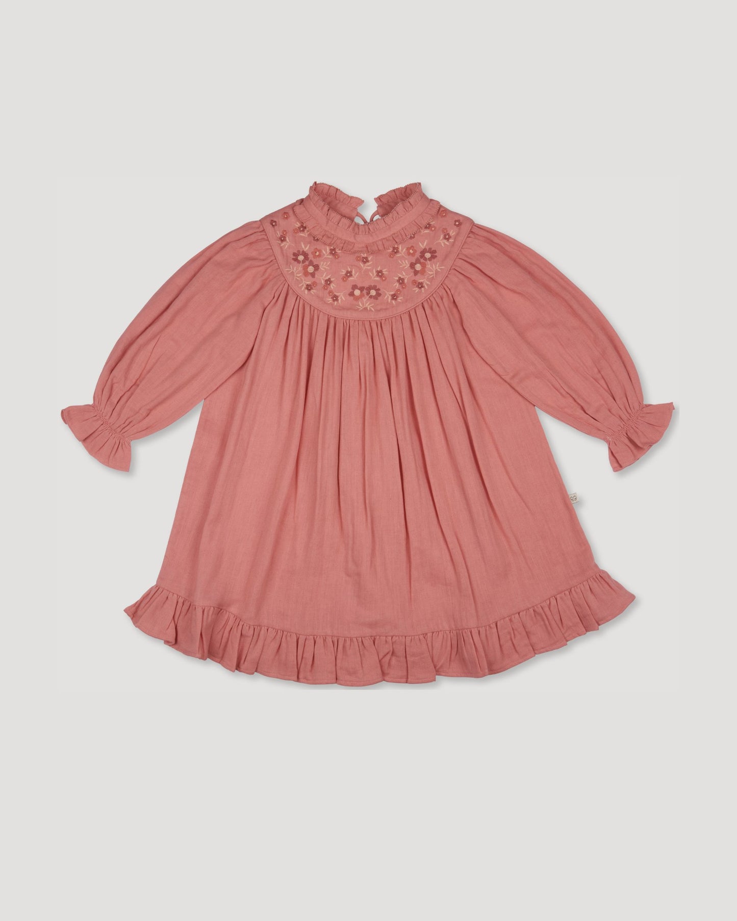 Early Sunday, Penelope Dress in Rose, made from Dyed Cotton Double Gauze fabric, featuring Hand-embroidered floral motifs, shown in a front flat-lay view