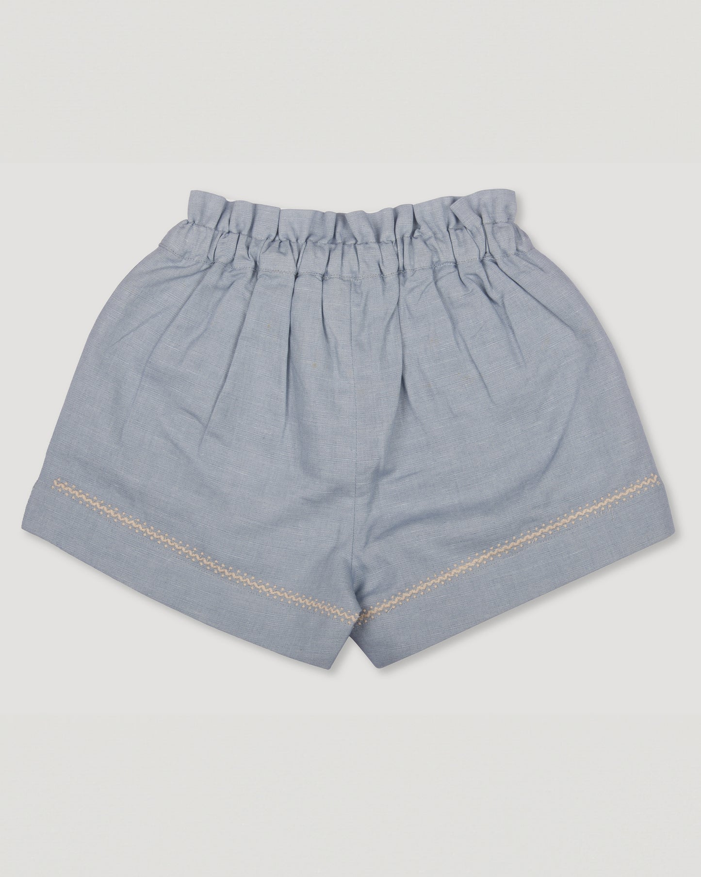 Early Sunday, Roman Shorts in Ocean Blue color, made from Canvas 70% Cotton 30% Linen fabric, featuring relaxed fit with delicate finishes, combining style and functionality, shown in a back flat lay view