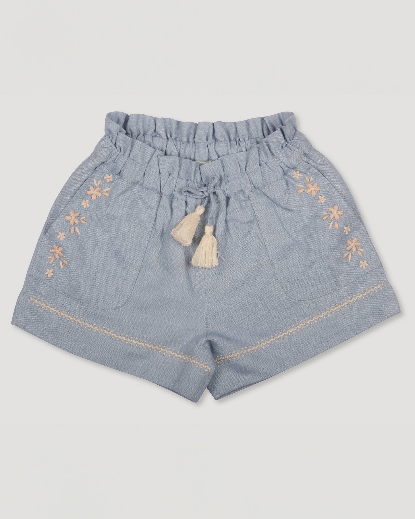 Early Sunday, Roman Shorts in Ocean Blue color, made from Canvas 70% Cotton 30% Linen fabric, featuring relaxed fit with delicate finishes, combining style and functionality, shown in a front flat lay view