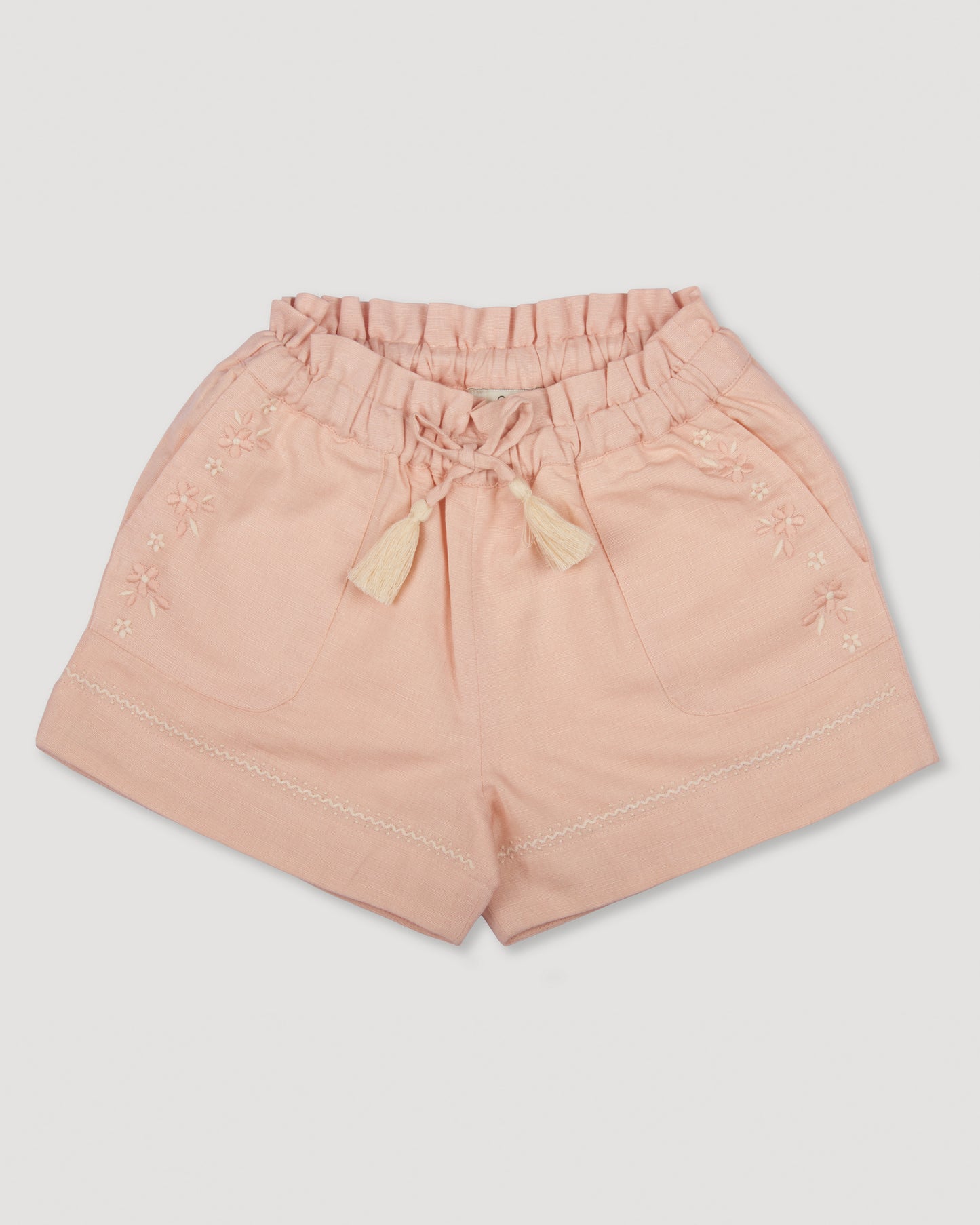 Early Sunday, Roman Shorts in Pink Sand color, made from Canvas 70% Cotton 30% Linen fabric, featuring relaxed fit with delicate finishes, combining style and functionality, shown in a front flat-lay view