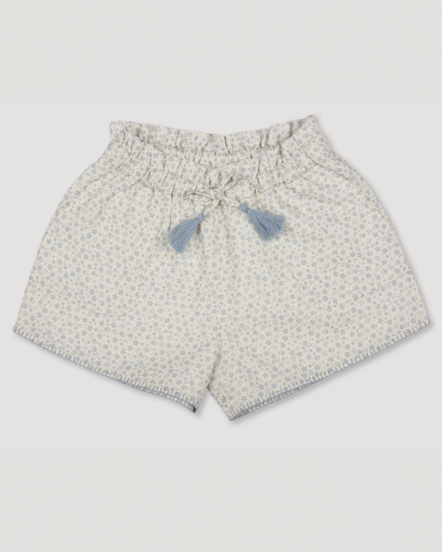Early Sunday, Roman Shorts in Mini Flower print, made from Printed canvas 70% Cotton 30% Linen fabric, featuring relaxed fit with delicate finishes, combining style and functionality, shown in a front flat-lay view