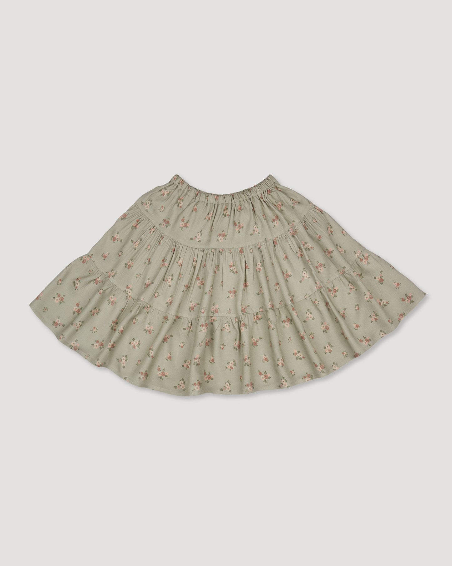 Early Sunday, Victoria Skirt in Ditsy Bouquet Jade print, made from Printed Viscose Rayon Twill fabric, featuring Tiered silhouette for natural movement and volume, shown in a front flat-lay view